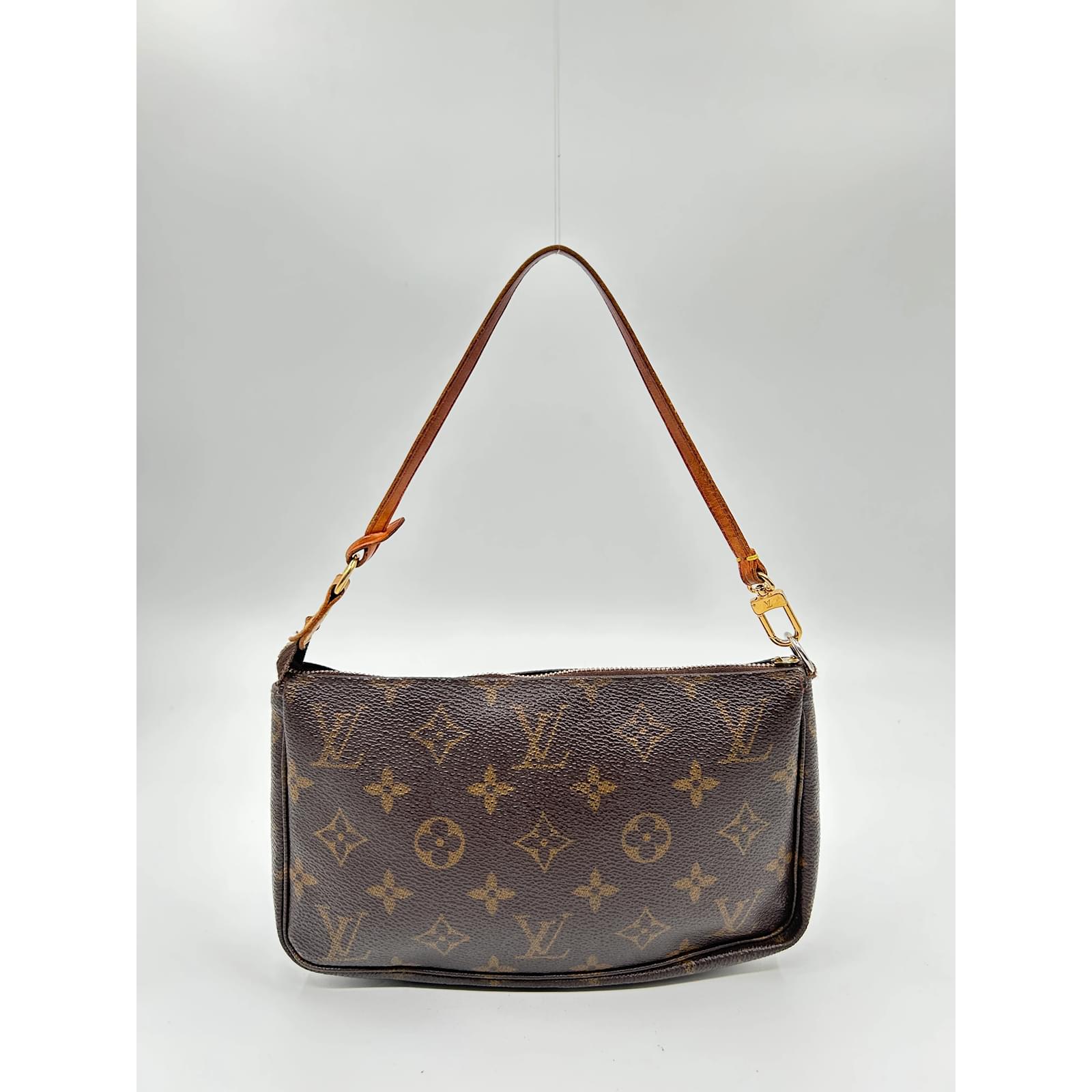 Pochette accessoire cloth handbag Louis Vuitton Brown in Cloth