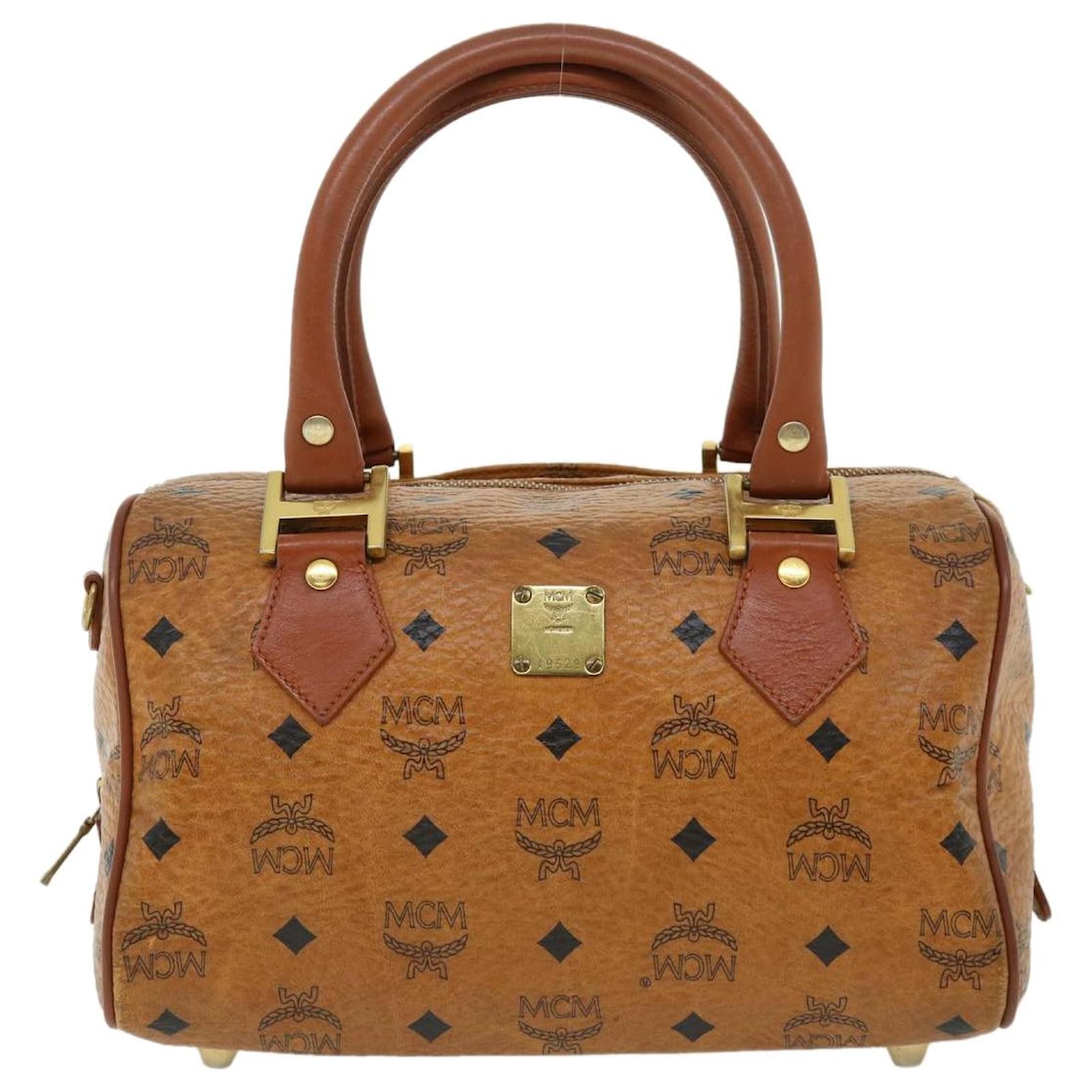 MCM - Visetos Boston Avec Bandoulière En Toile Enduite Marron Et Monogramme Cognac Avec Sangle 872804