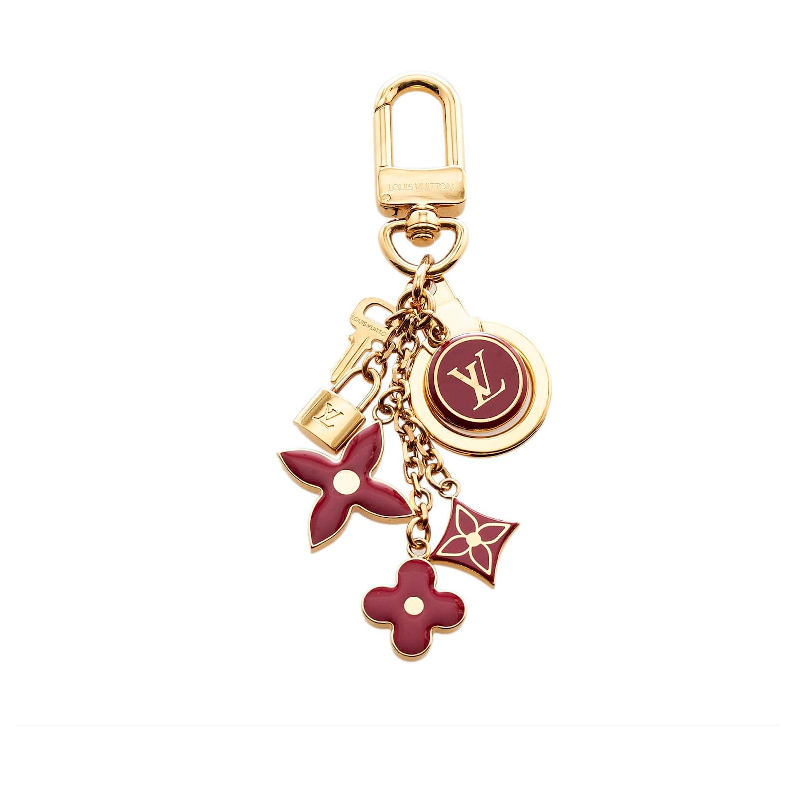 Louis Vuitton Gold Fleur De Monogram Charms Key Chain Golden Metal  ref.836284 - Joli Closet
