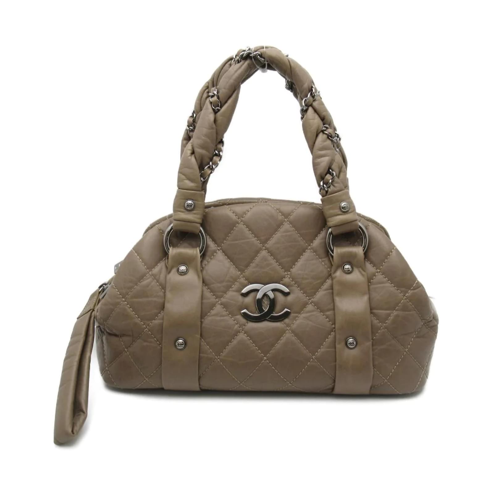 Chanel CC Quilted Leather Lady Braid Bowler Handbag Beige Lambskin  ref.840256 - Joli Closet