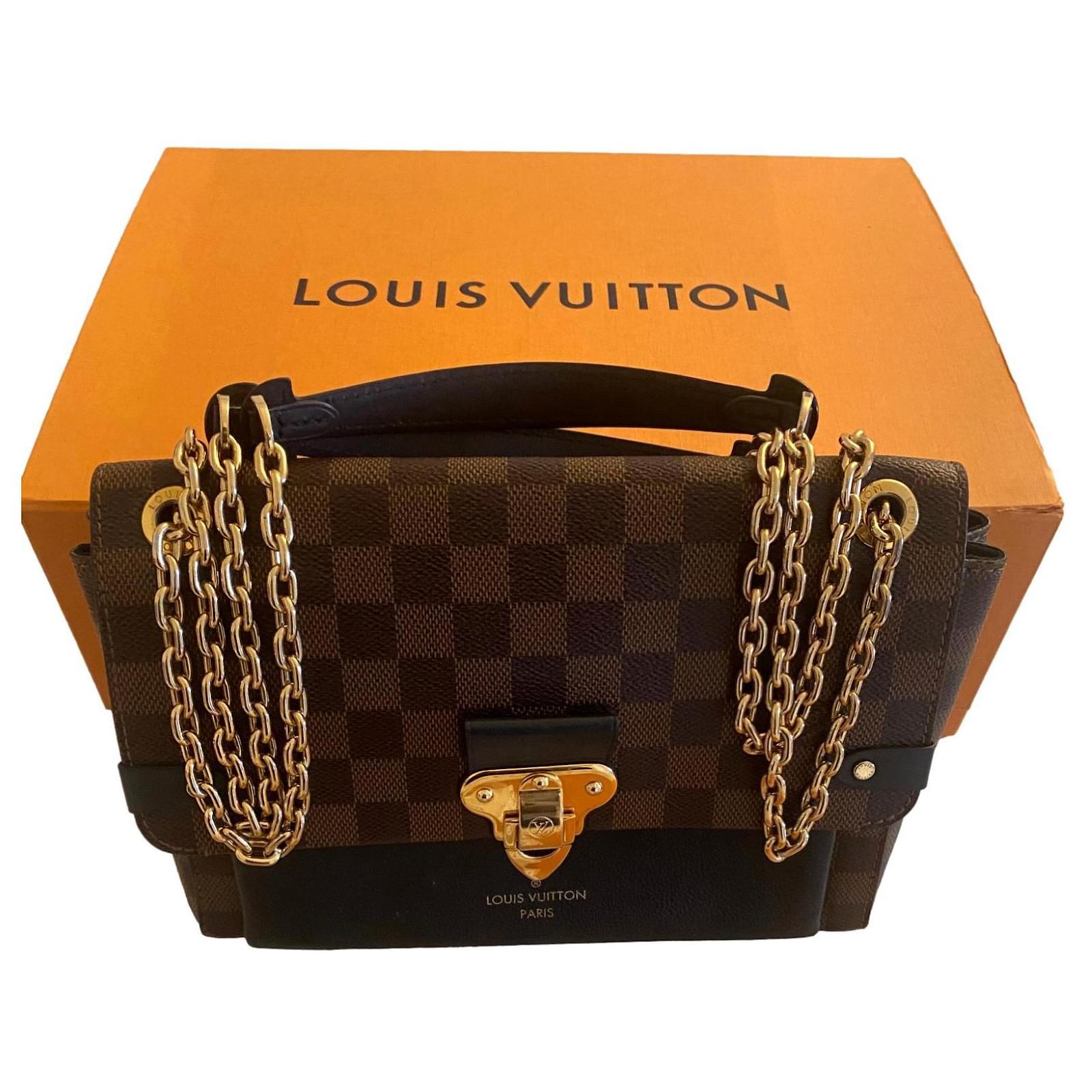 Woman with Black Louis Vuitton Bag with Golden Logo and Brown
