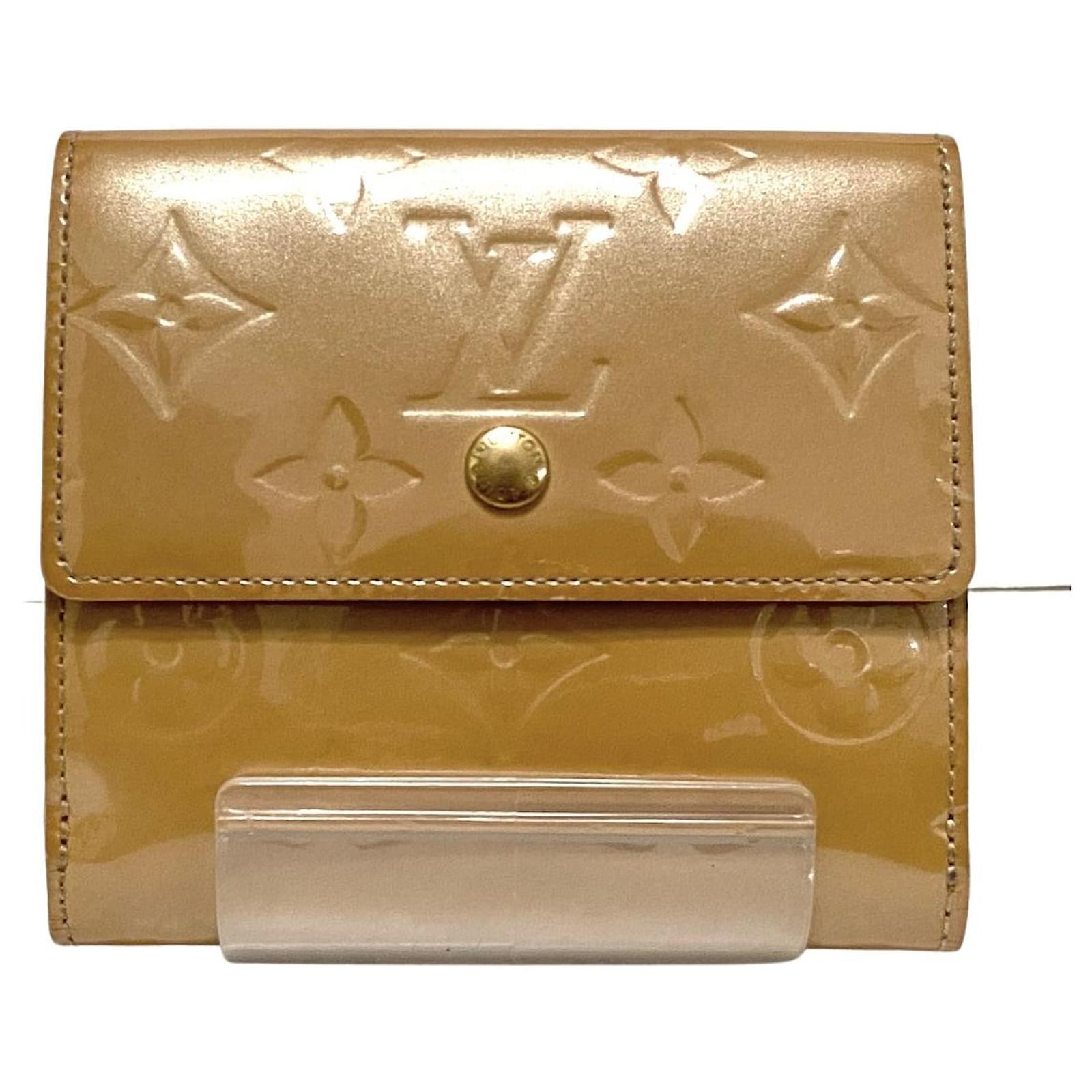 Louis Vuitton Porte Monnaie Coeur Golden Patent leather ref.772357 - Joli  Closet