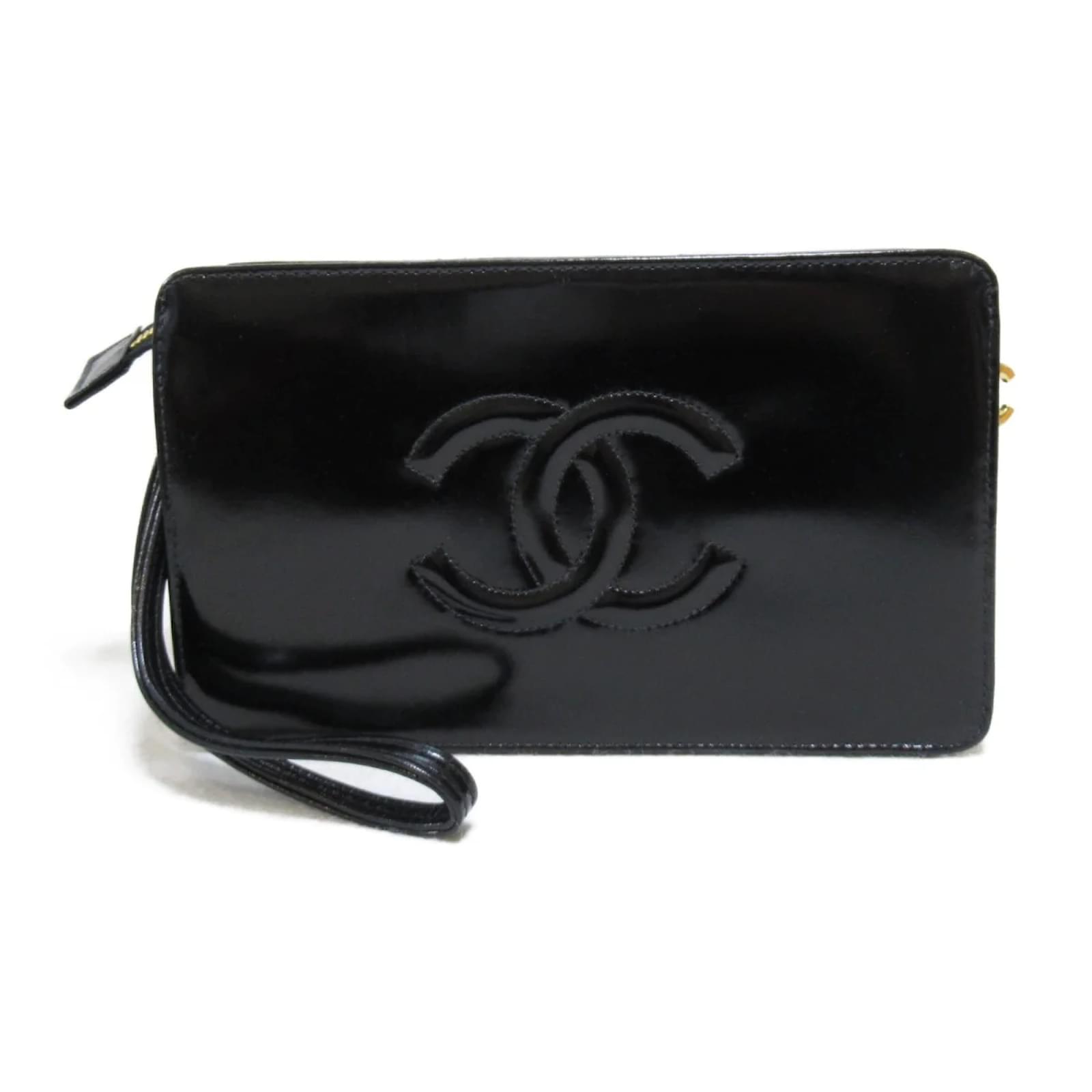 Pochette Chanel avec chaîne en agneau matelassé noir