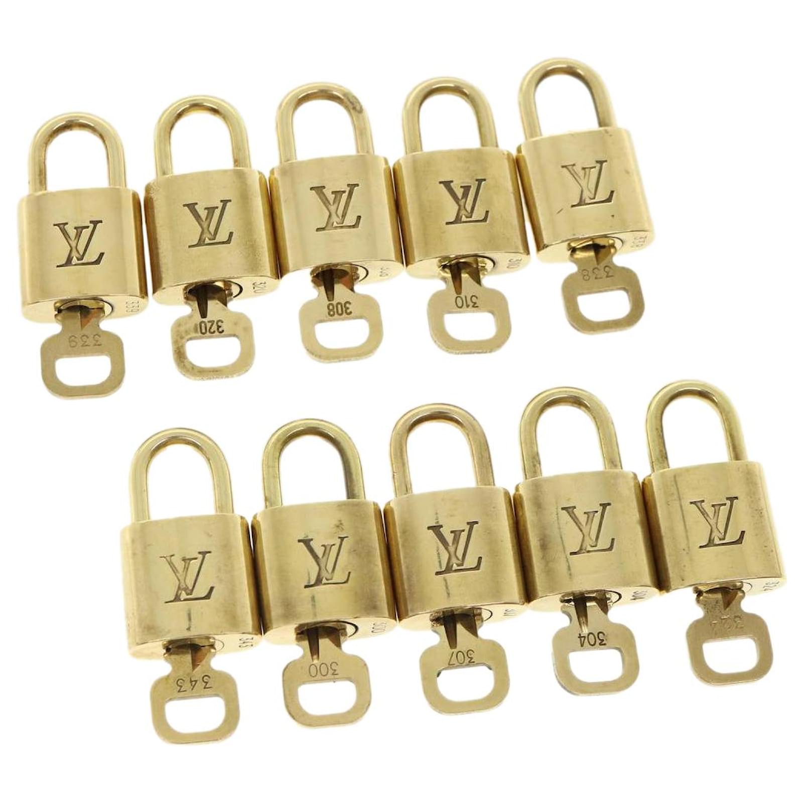Louis Vuitton padlock 10Set Gold Tone LV Auth 47538 Metal ref.987406 - Joli  Closet