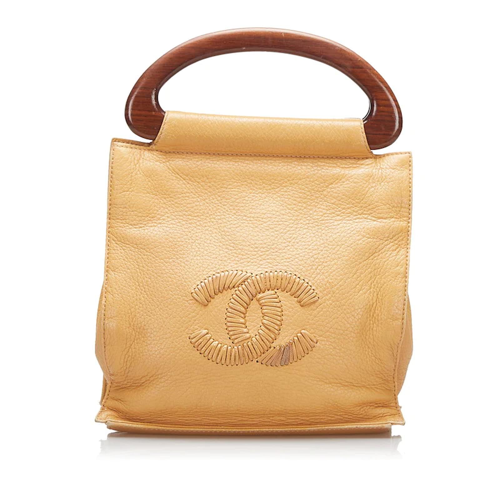 Chanel CC Leather Wood Handle Bag Beige Pony-style calfskin ref.849281 -  Joli Closet
