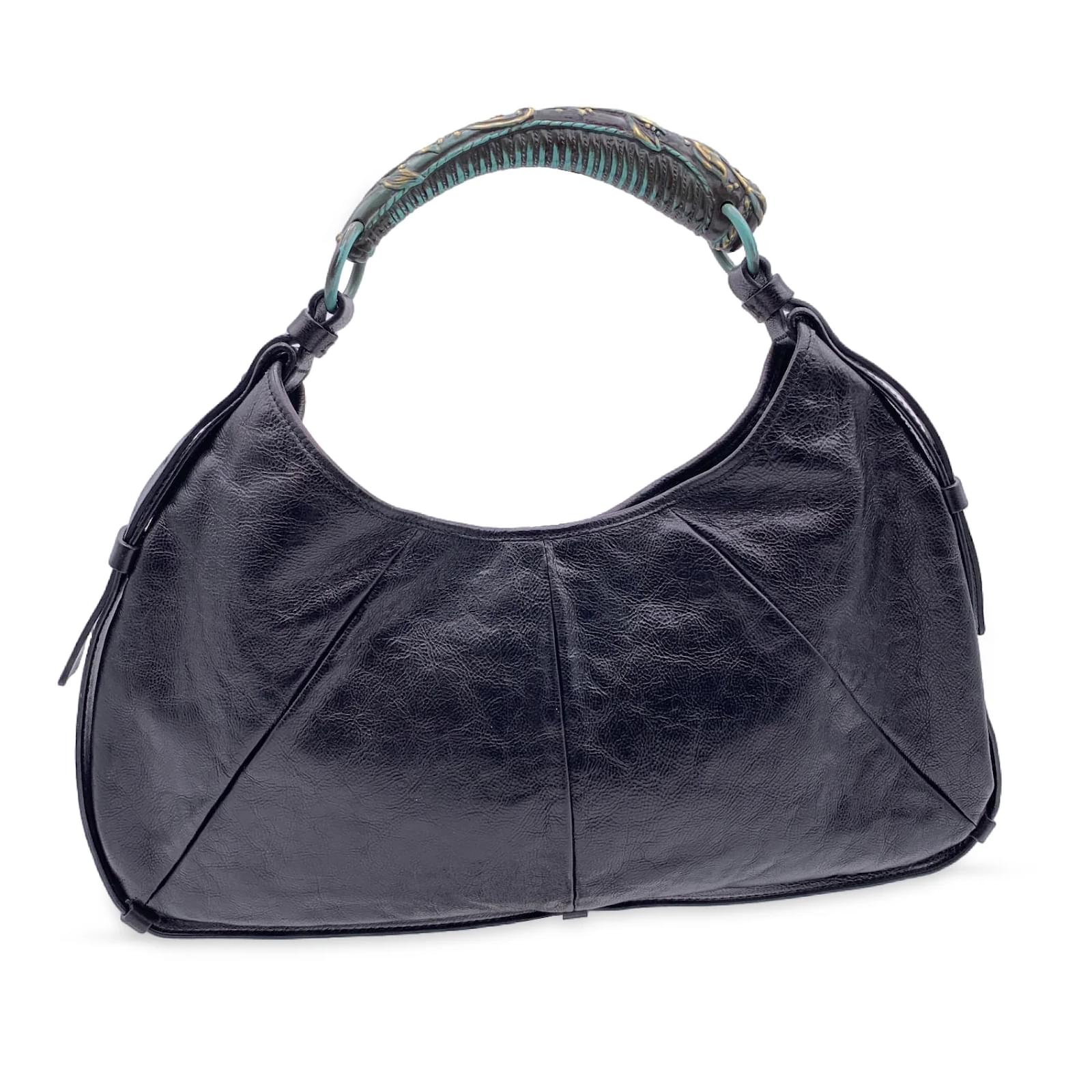 Yves Saint Laurent black suede bag with silver metal horn handle