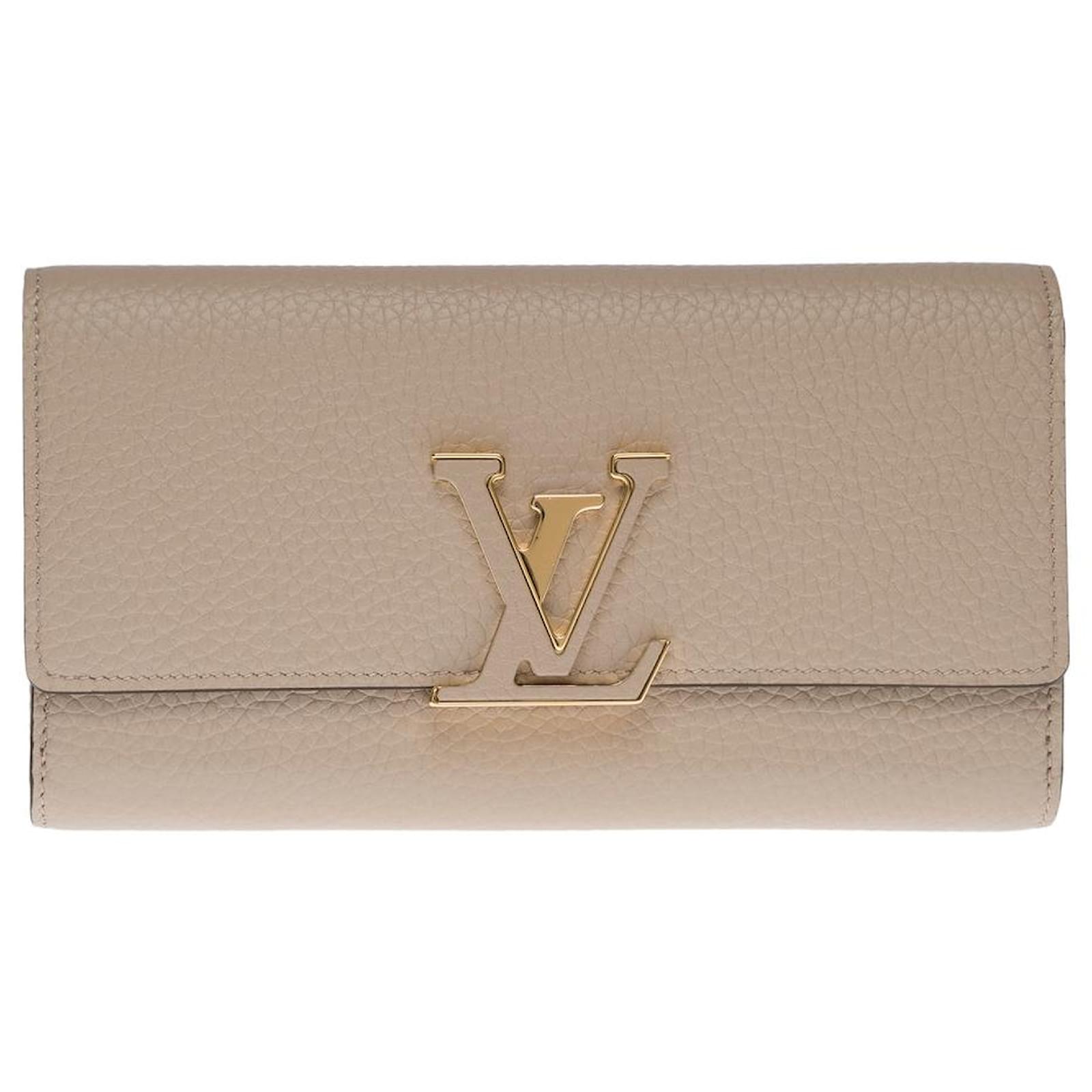LOUIS VUITTON CAPUCINES WALLET IN GRAY GALLET AND BROWN TAURILLON LEATHER  ref.855581 - Joli Closet