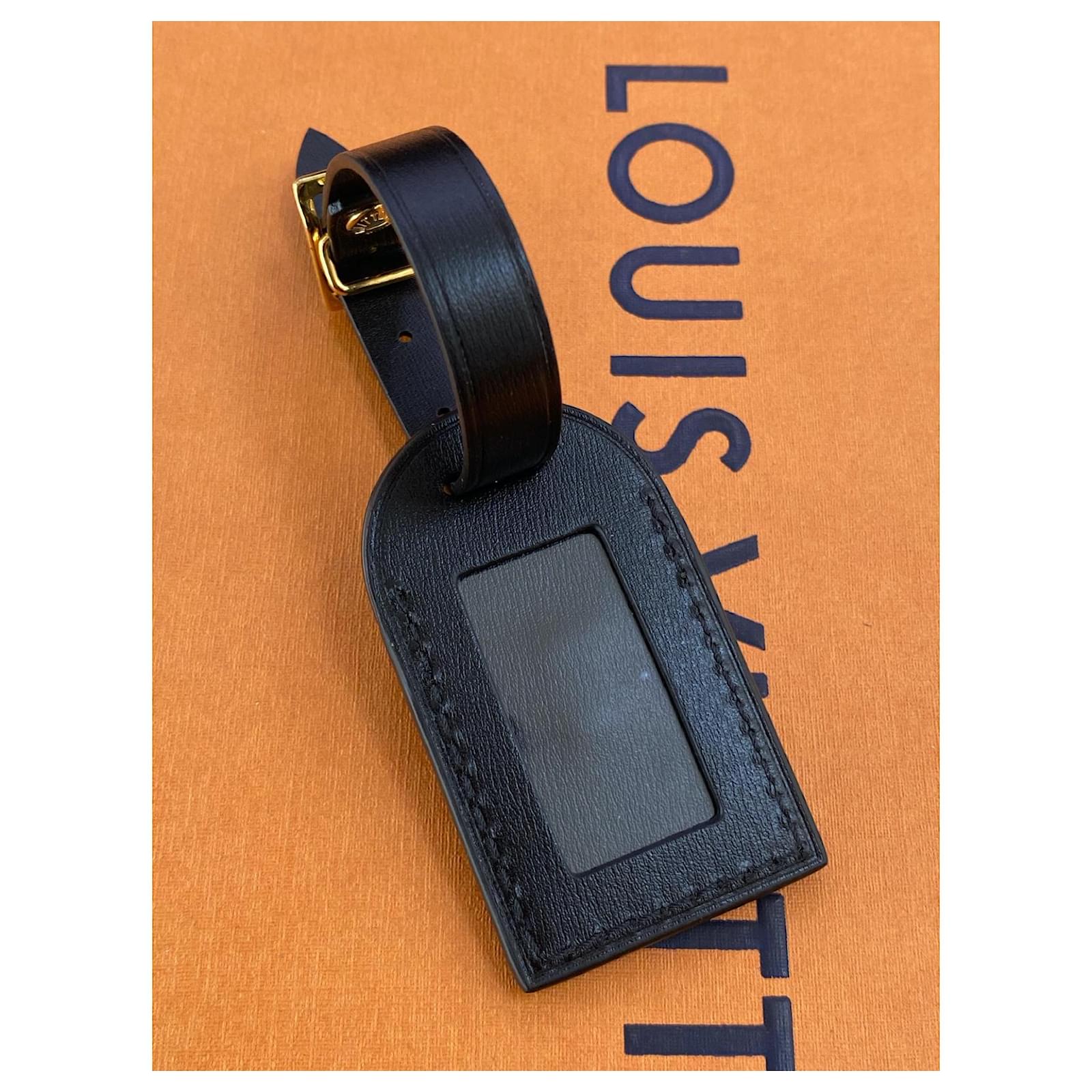 Louis Vuitton luggage tag black Golden Leather Metal ref.864432 - Joli  Closet