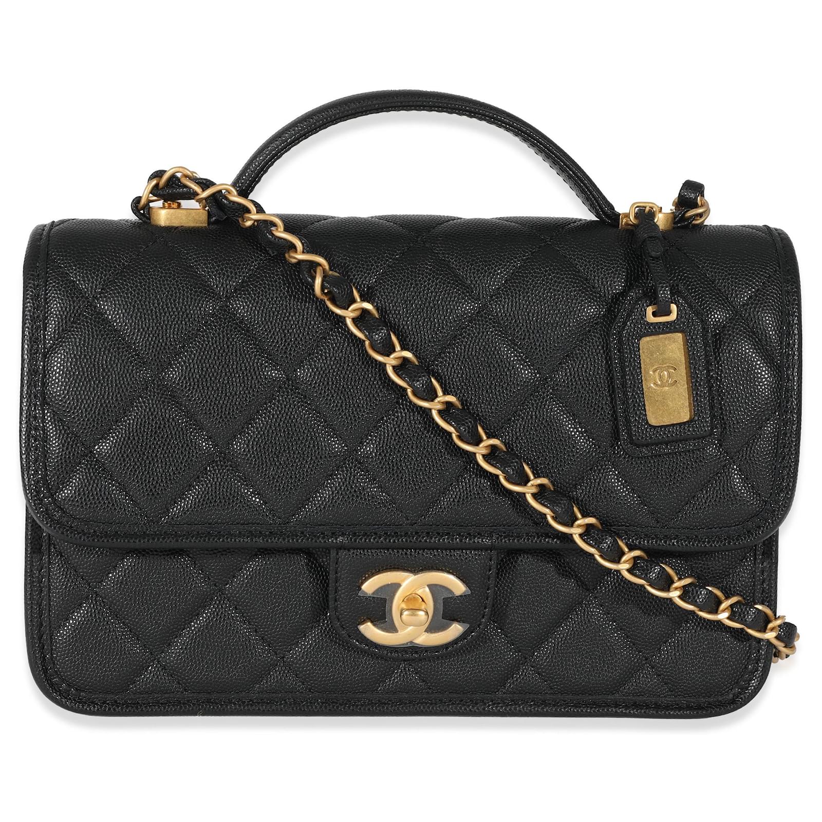 What fits in the Chanel 22K Small Flap Bag 