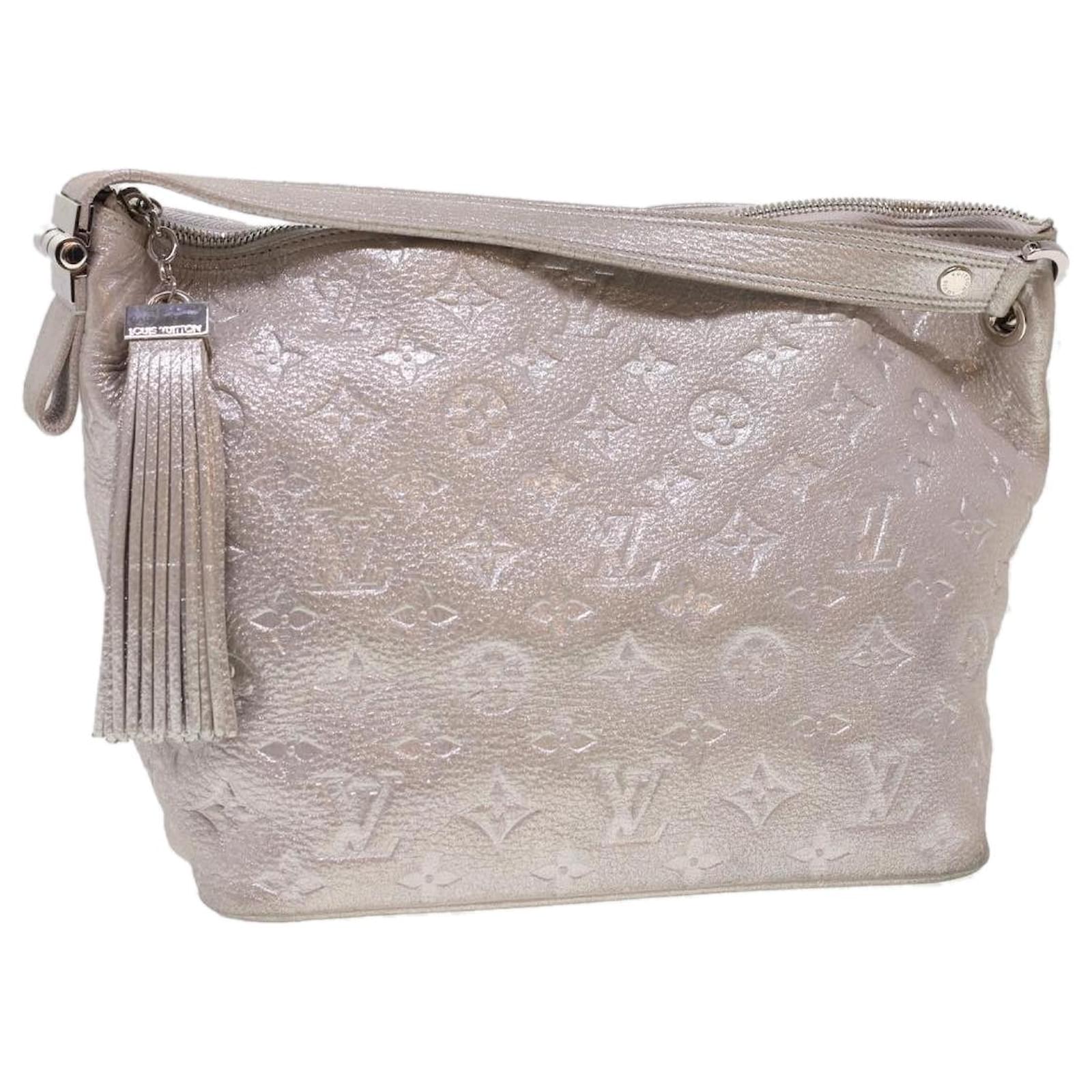 LOUIS VUITTON Monogram Shimmer Halo Hand Bag Silver Argent LV Auth 40188  Silvery Cloth ref.887941 - Joli Closet