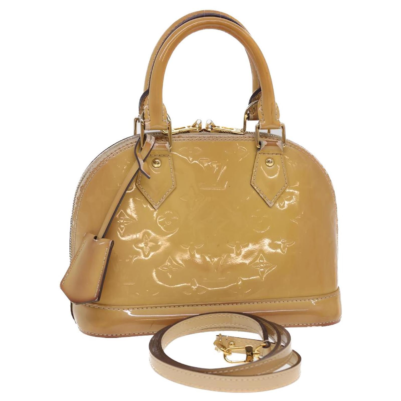 Alma bb patent leather handbag Louis Vuitton Beige in Patent