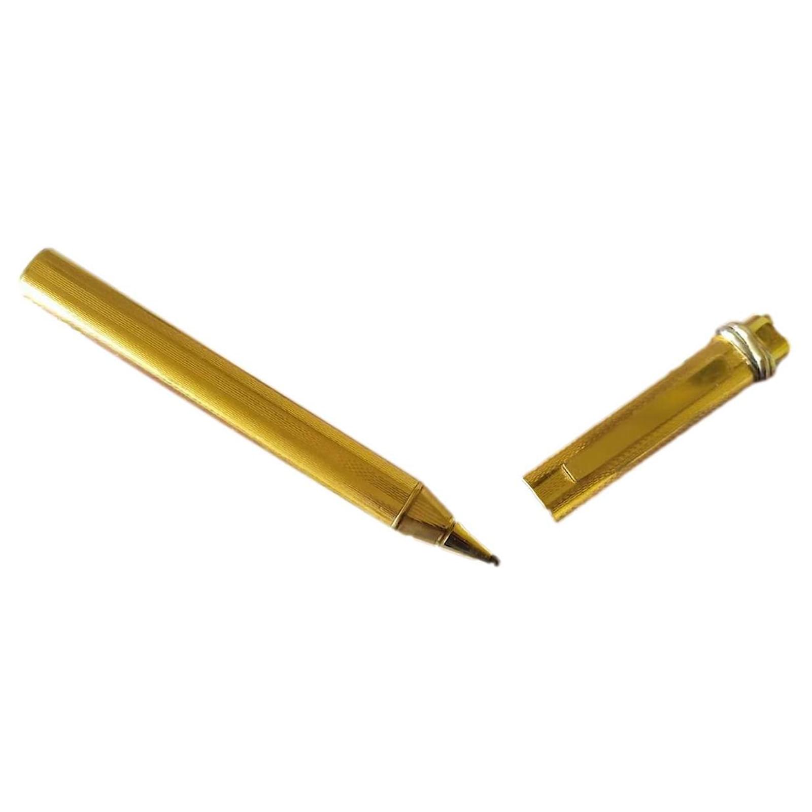 Must de Cartier Trinity Vintage gold-plated ballpoint pen and its