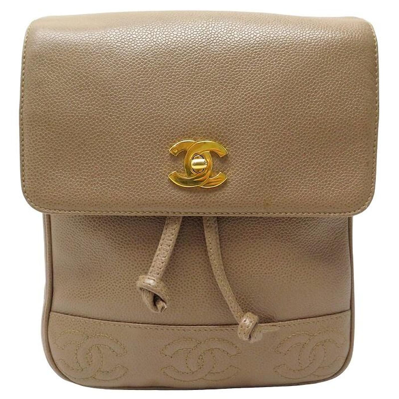 VINTAGE CHANEL BACKPACK WITH CC LOGO CLASP IN TAUPE CAVIAR LEATHER