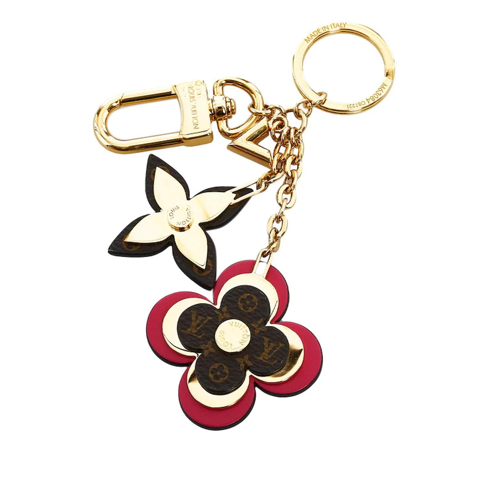 Louis Vuitton Blooming Flowers Bag Charm & Key Holder M63084 Golden Metal  ref.909563 - Joli Closet