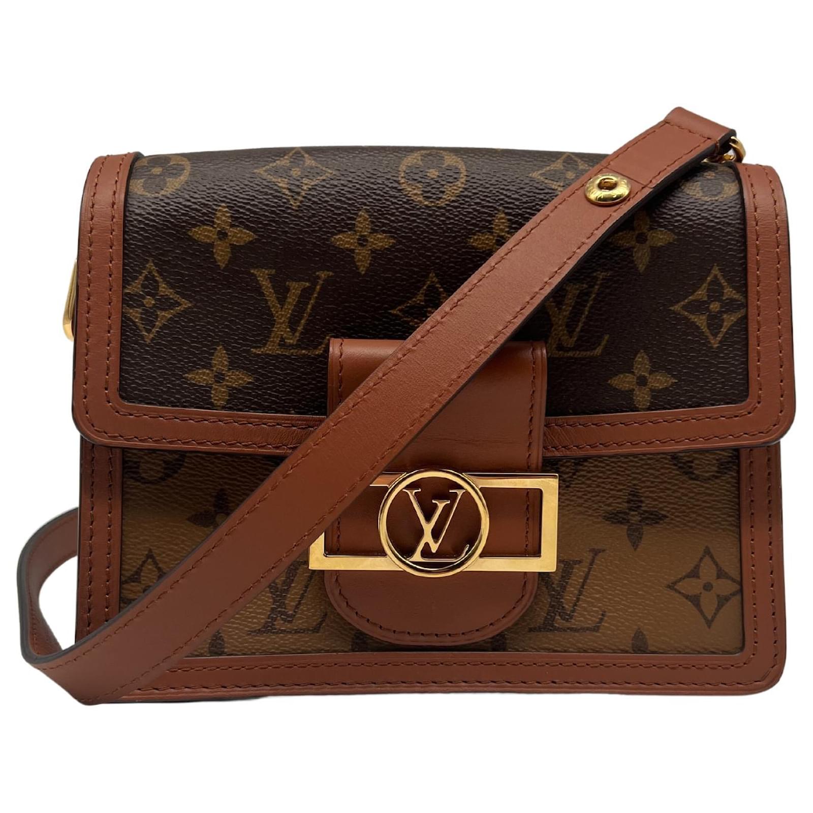 Dauphine mini leather handbag Louis Vuitton Brown in Leather