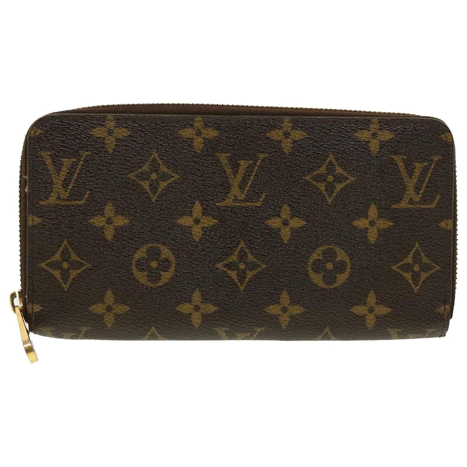 Louis Vuitton Portefeuille zippy Brown Cloth ref.915176 - Joli Closet