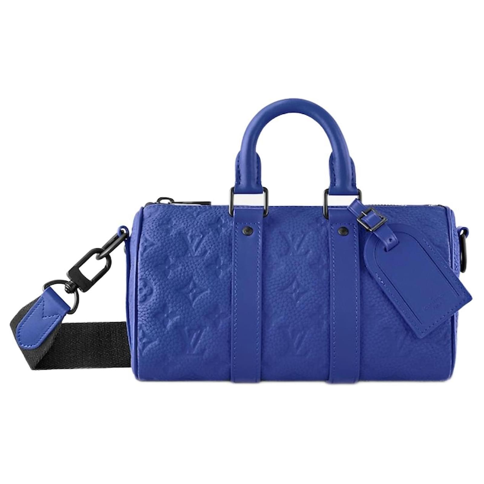 Louis Vuitton LV Keepall 25 Leather Handbag