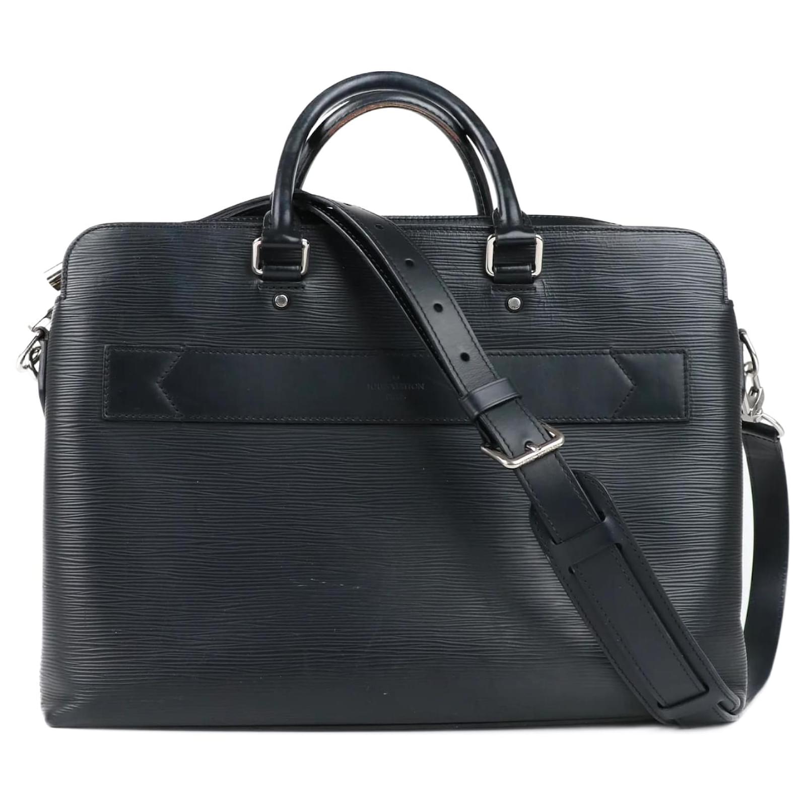 Louis Vuitton T. Leather Handbag
