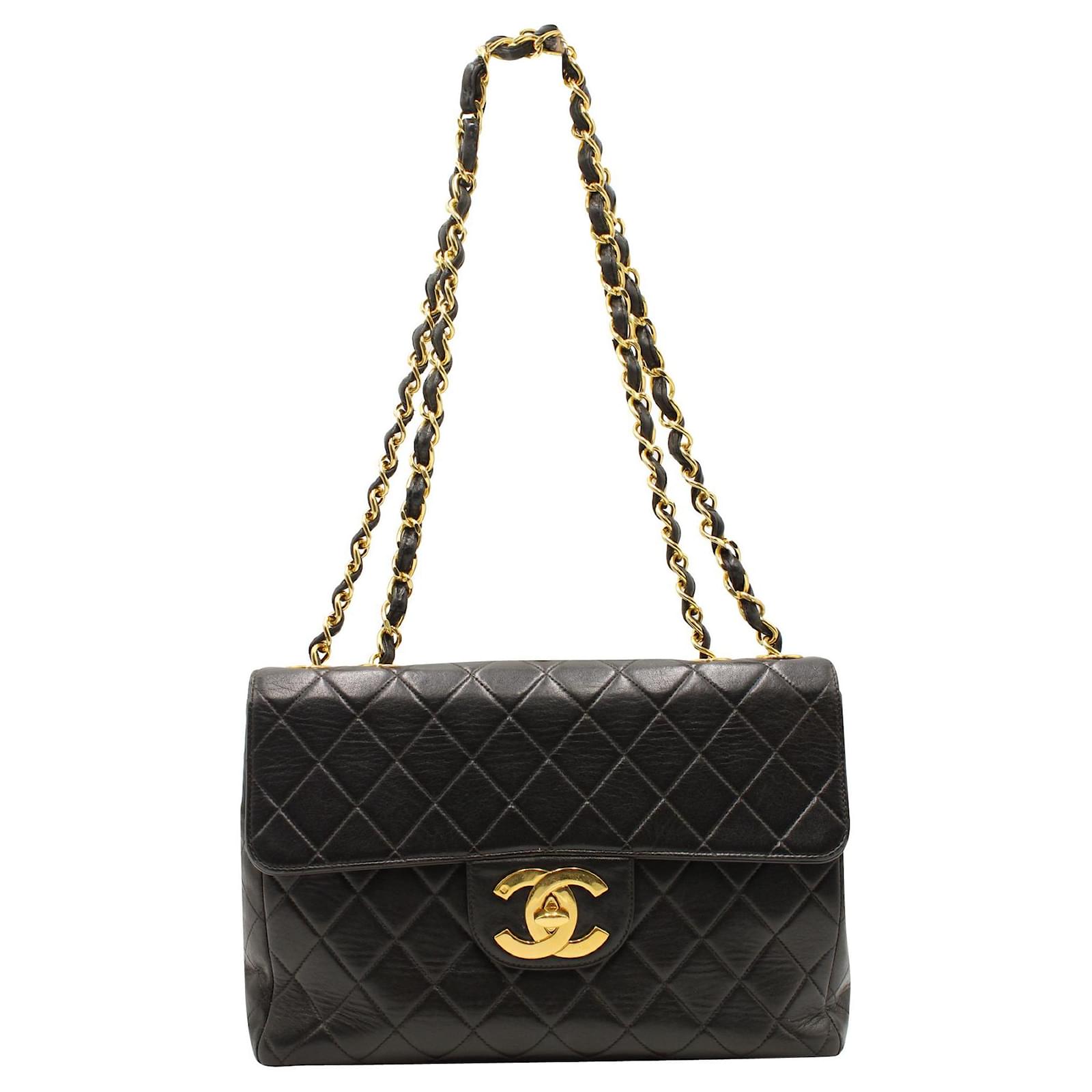 Timeless Chanel 1990s Vintage Black Classic Flap Bag with Golden