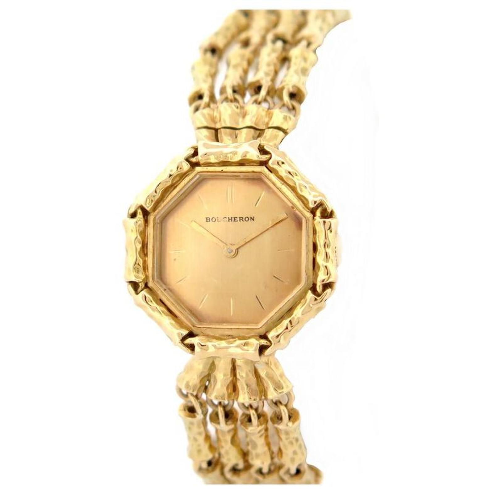 VINTAGE BOUCHERON WATCH 23 mm in yellow gold 18K MECHANICAL YELLOW GOLD WATCH Golden ref.928083