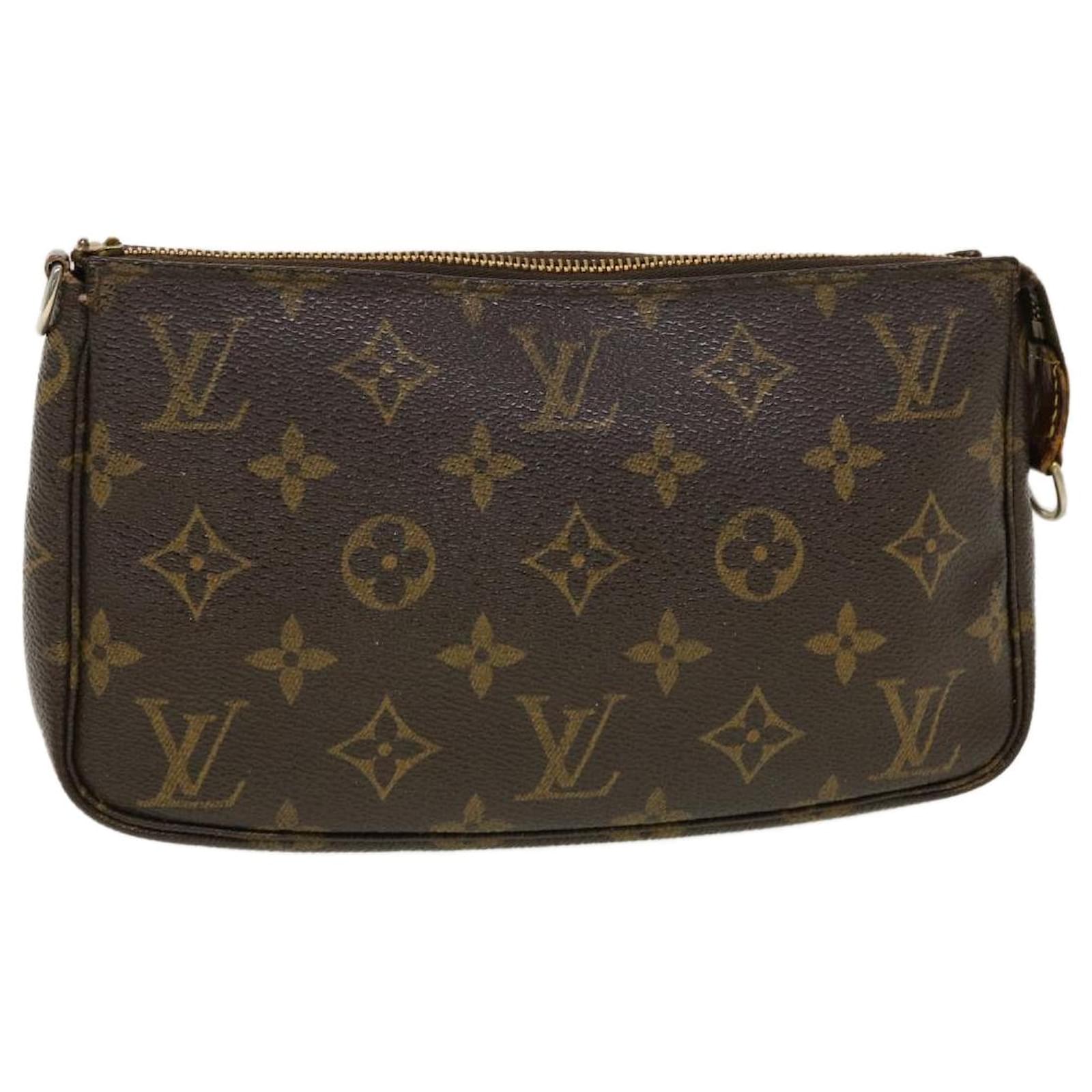 Pochette accessoire cloth handbag Louis Vuitton Brown in Cloth