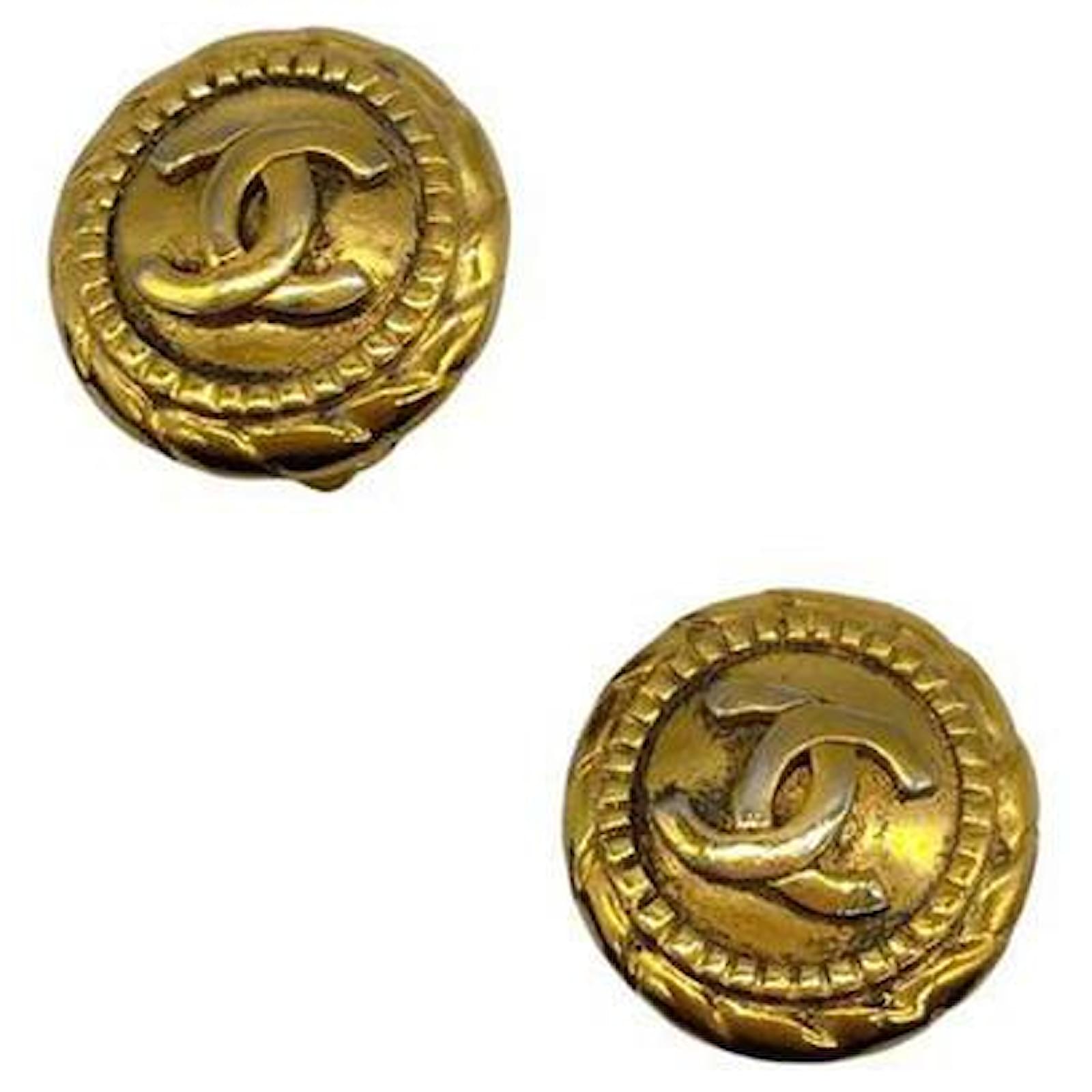 Vintage CHANEL gold tone round earrings with large CC mark at