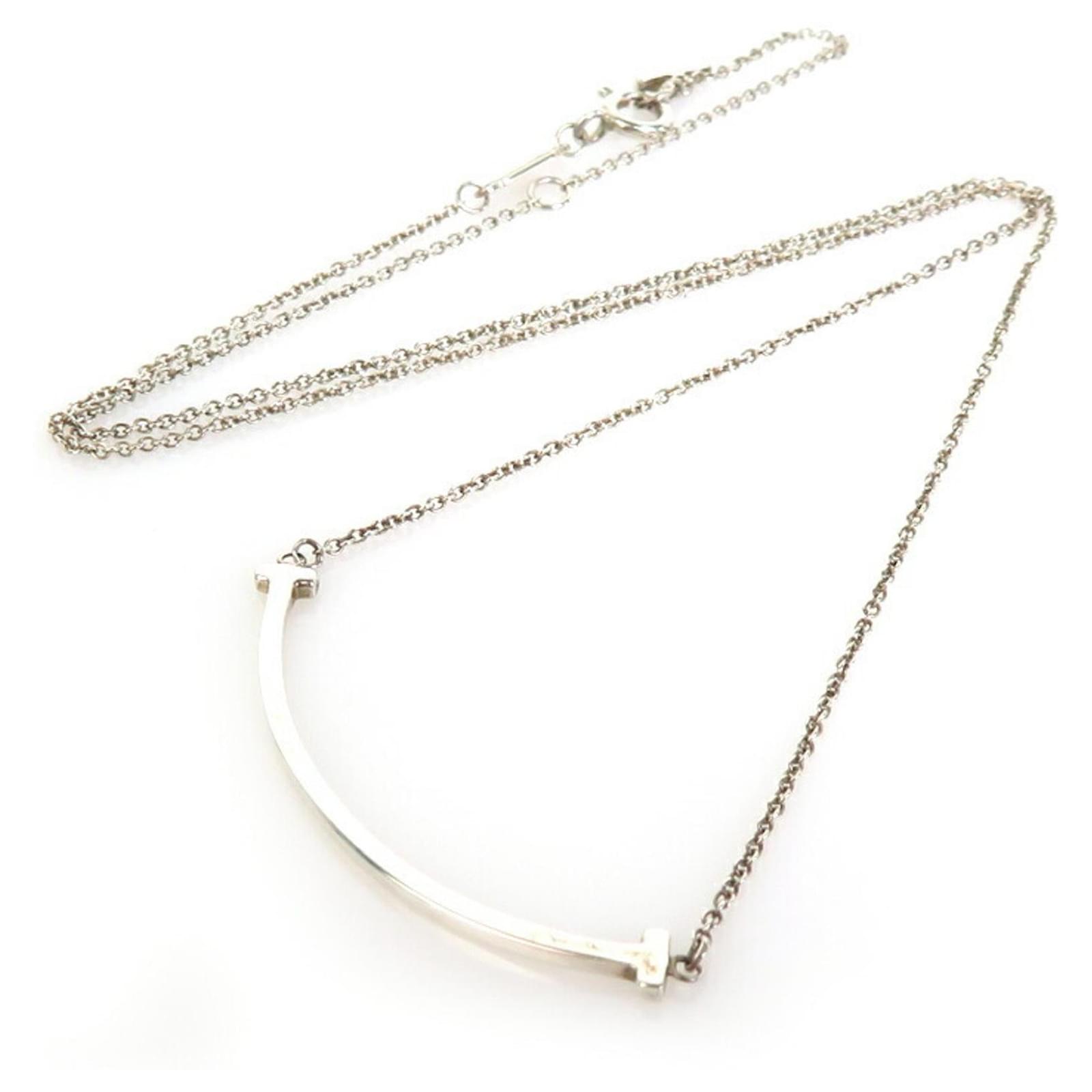 Tiffany T smile pendant in 18k white gold. | Tiffany & Co.
