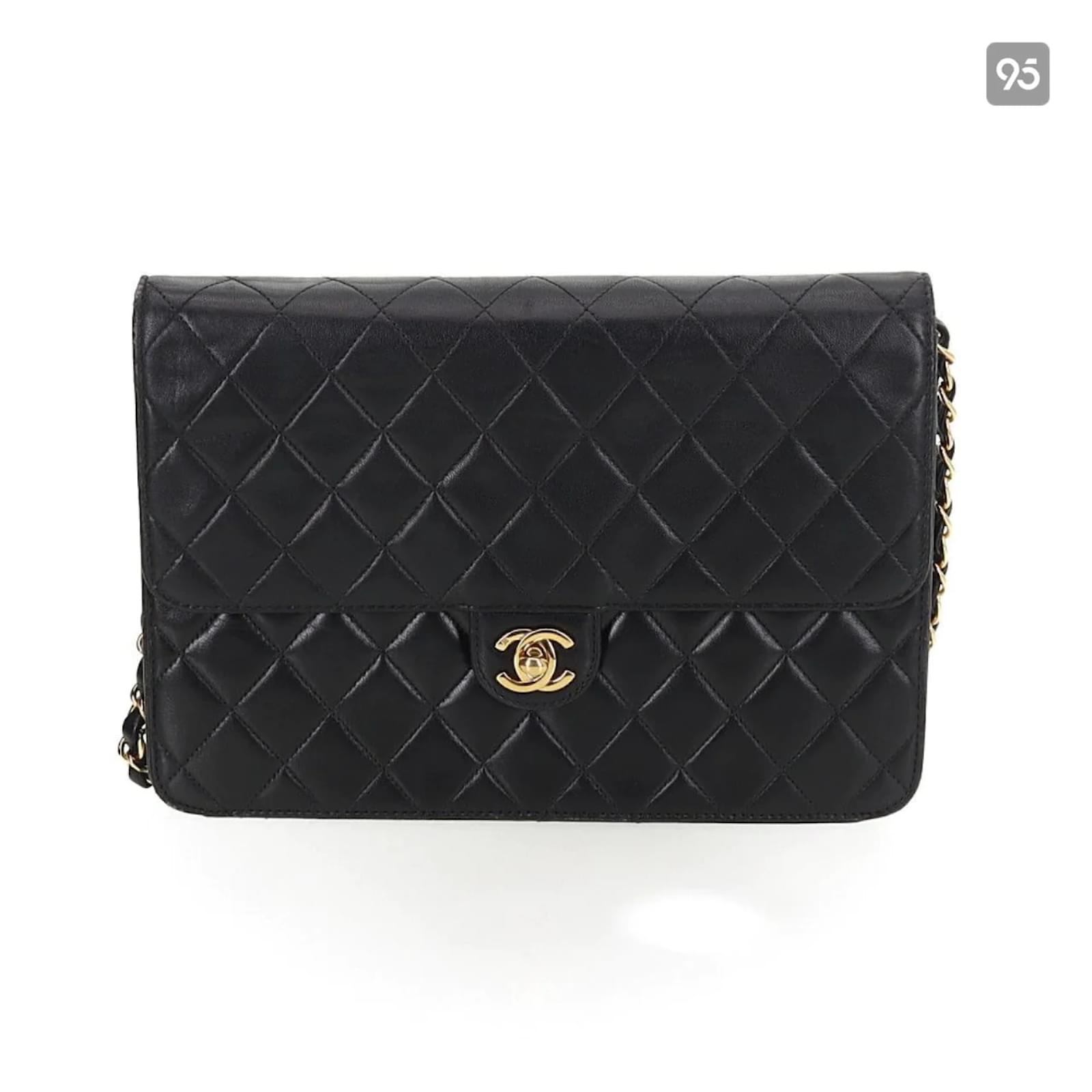 Chanel Vintage Mademoiselle Black Lambskin 24K Gold Hardware Bag