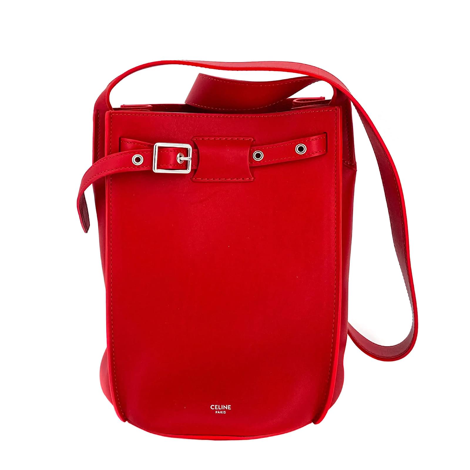 Red leather bucket online bag