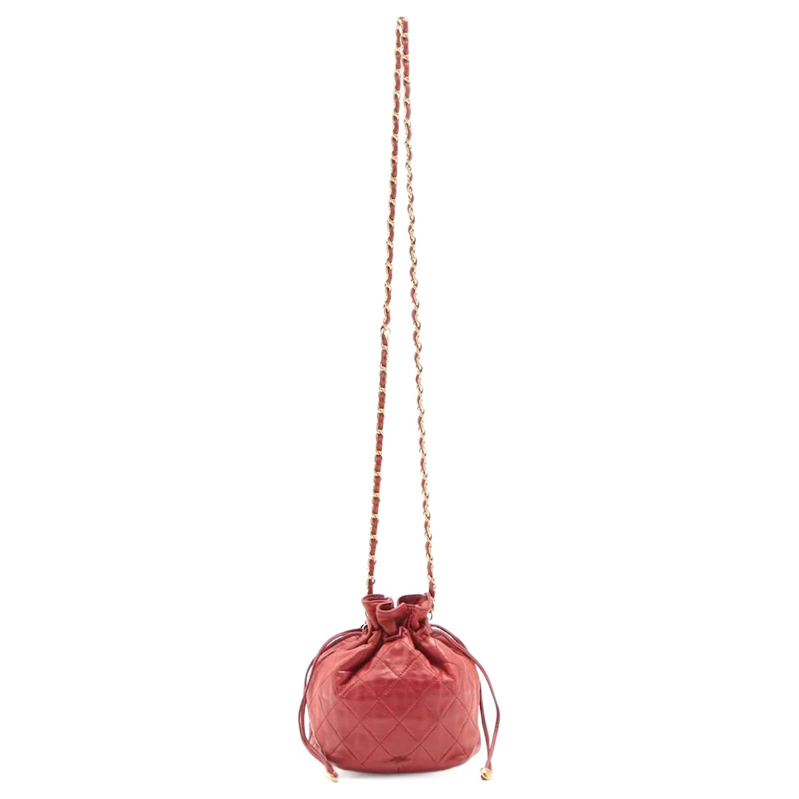 Mini Drawstring Bucket 1986-1988 Red Quilted Lambskin Gold