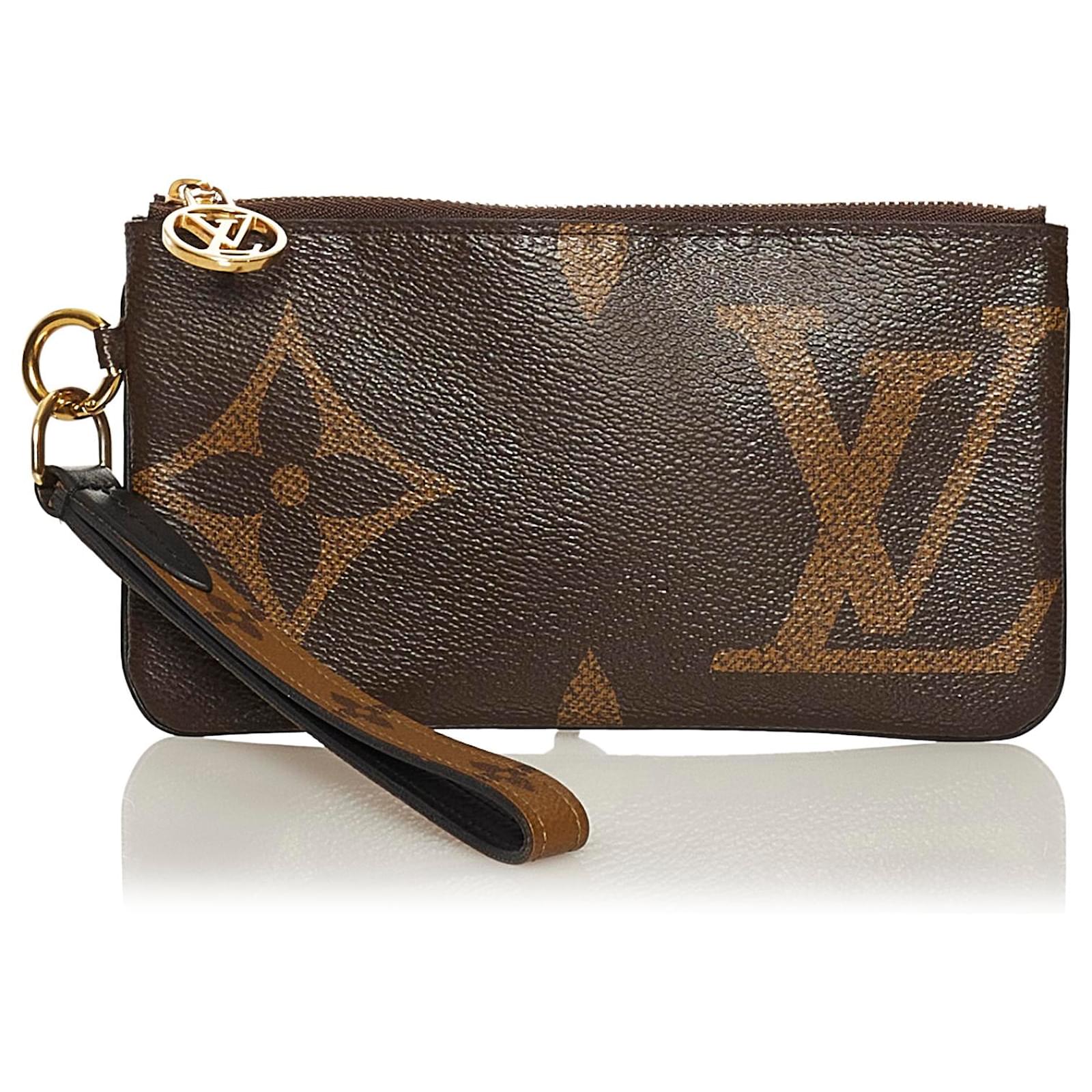 Trio pouch leather clutch bag Louis Vuitton Brown in Leather