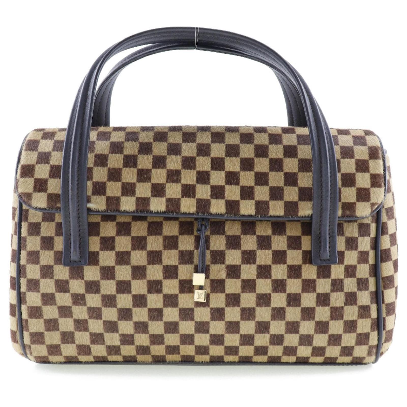 Reintroducing The Louis Vuitton Saumur Bag