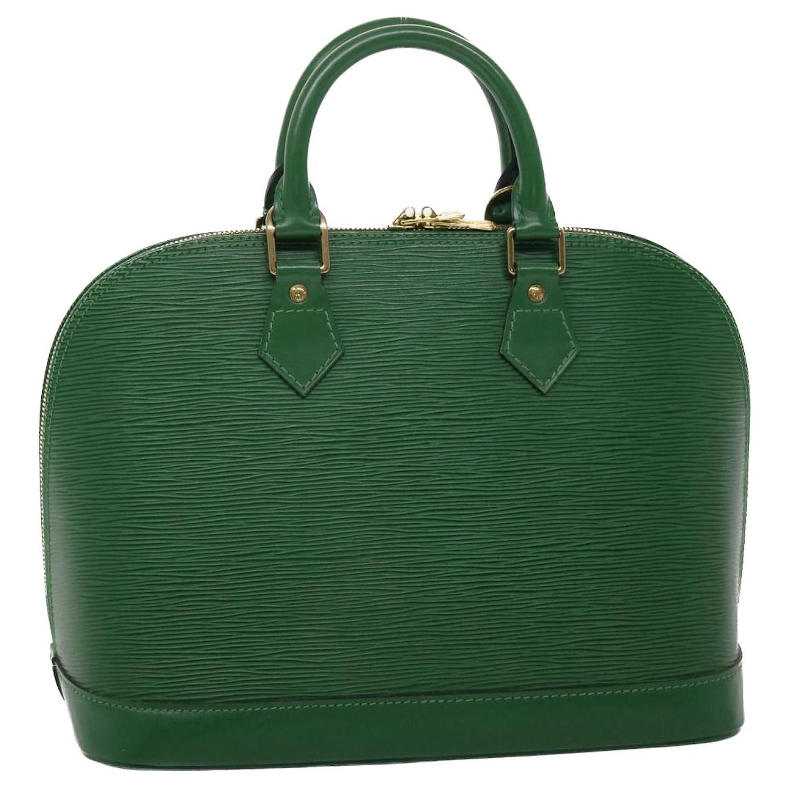 Green Louis Vuitton Alma bag. The perfect size and shape for