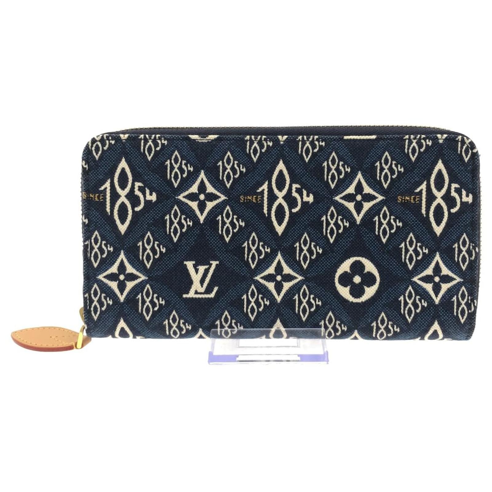 LOUIS VUITTON Blue Since 1854 Canvas Zippy Wallet - The Purse Ladies