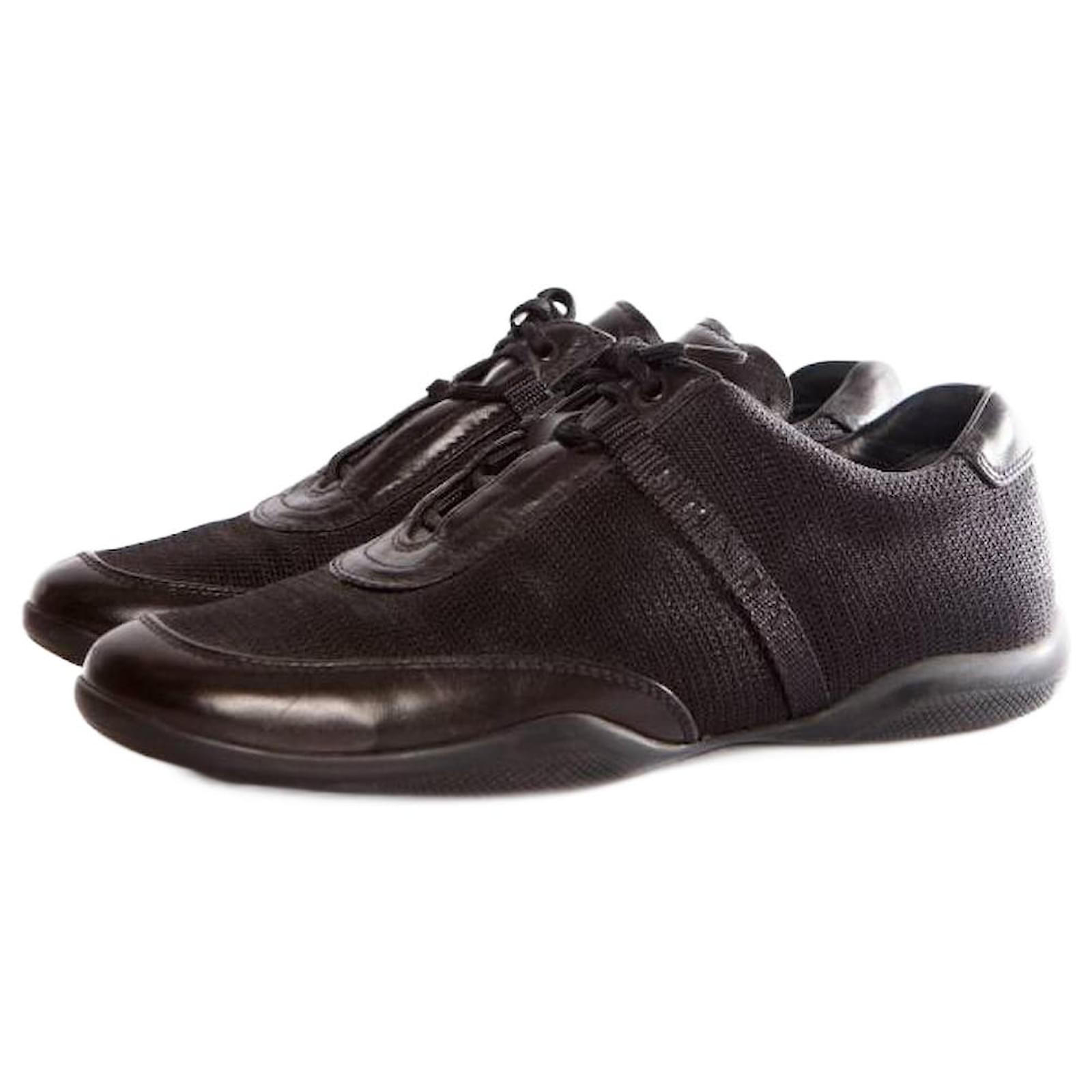 Prada, black sneakers with prada logo. Leather ref.1002481 - Joli