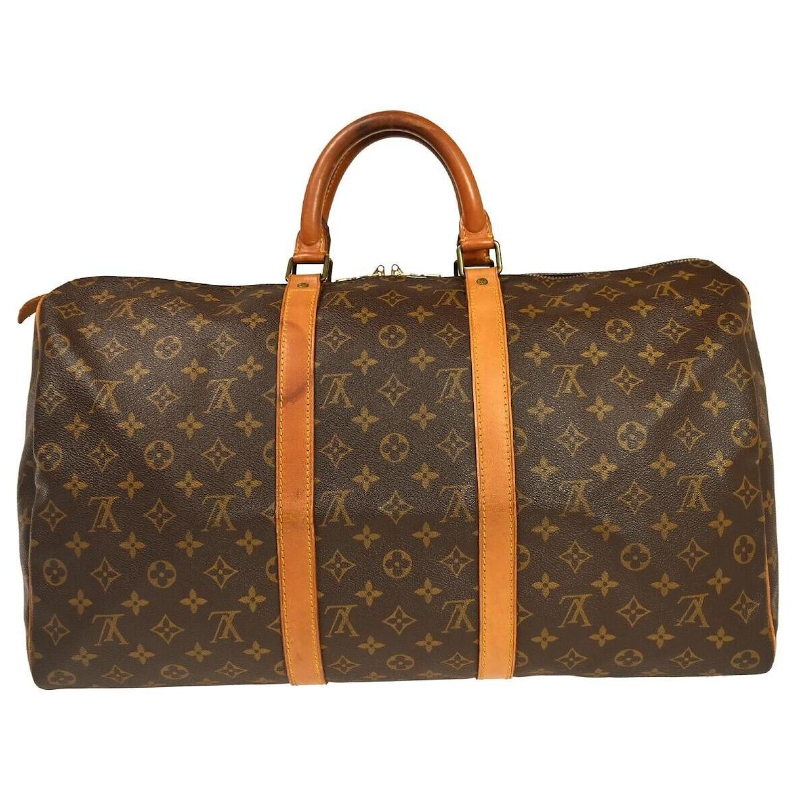 A CLASSIC MONOGRAM KEEPALL 55 WITH GOLDEN BRASS HARDWARE, LOUIS