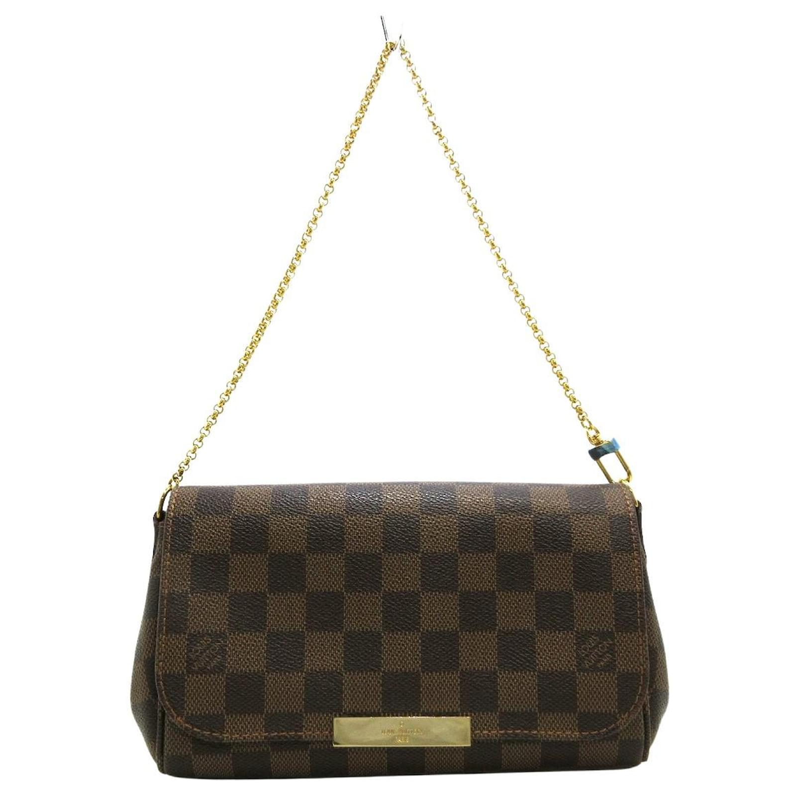 Favorite cloth handbag Louis Vuitton Brown in Cloth - 26441279