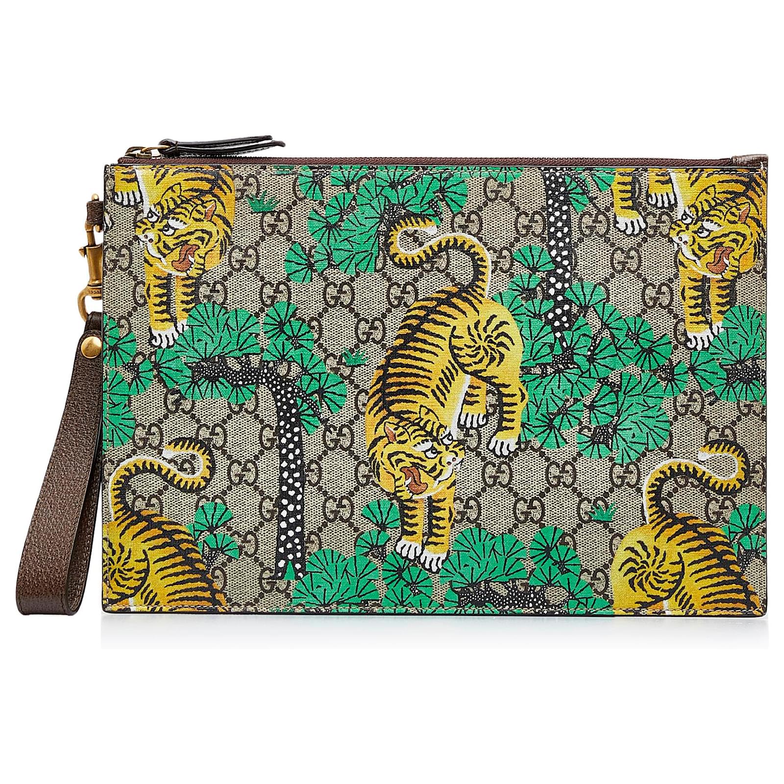 Pochette hot sale gucci tigre