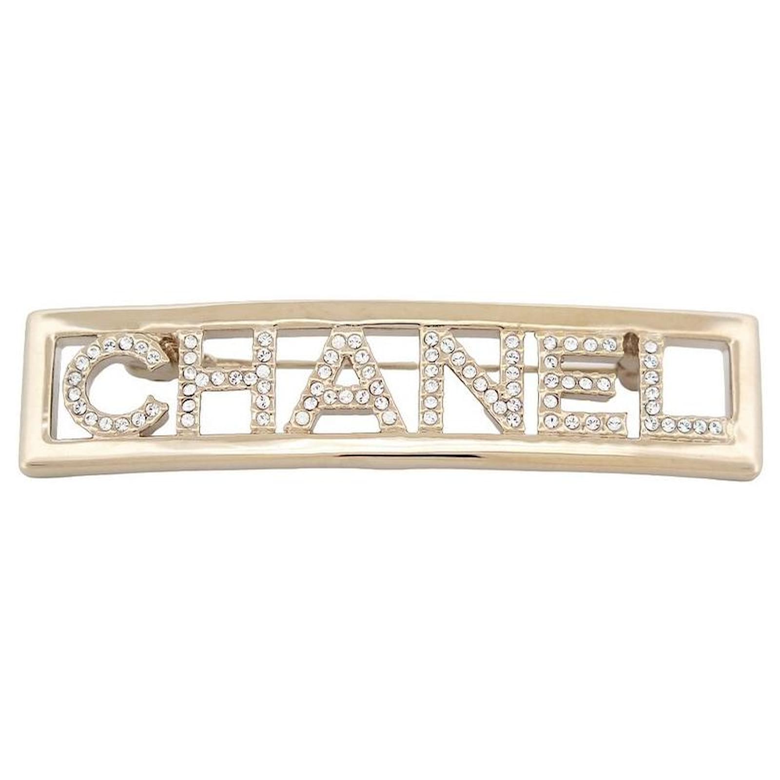 Chanel metal CC brooch with glass beads embellishment