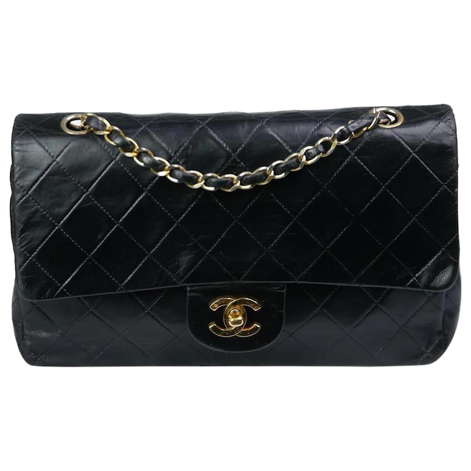 Chanel Black 1989-1991 vintage medium lambskin Classic gold hardware lined flap  bag Leather ref.984217 - Joli Closet