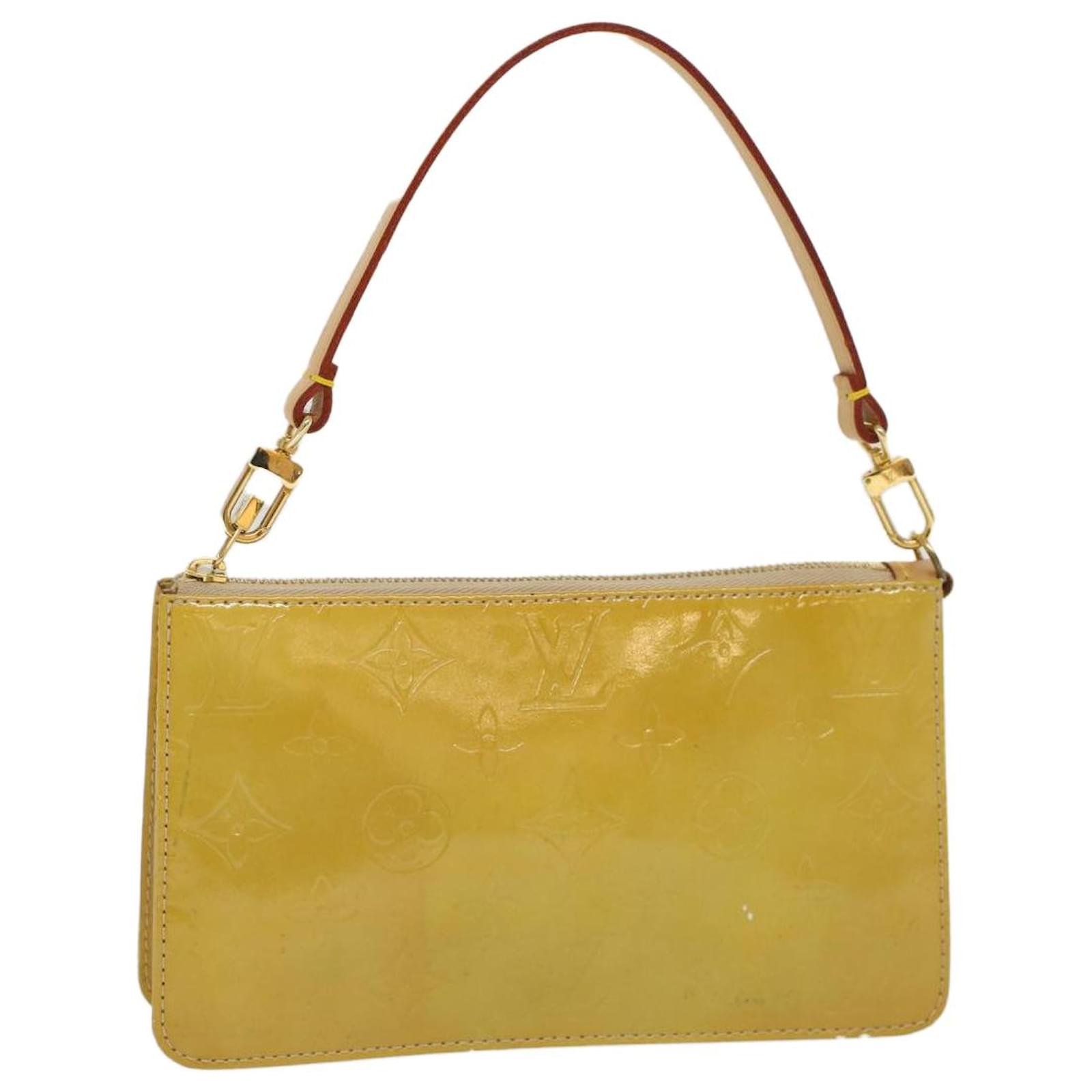 Louis Vuitton Lexington Beige Patent Leather Clutch Bag (Pre-Owned)
