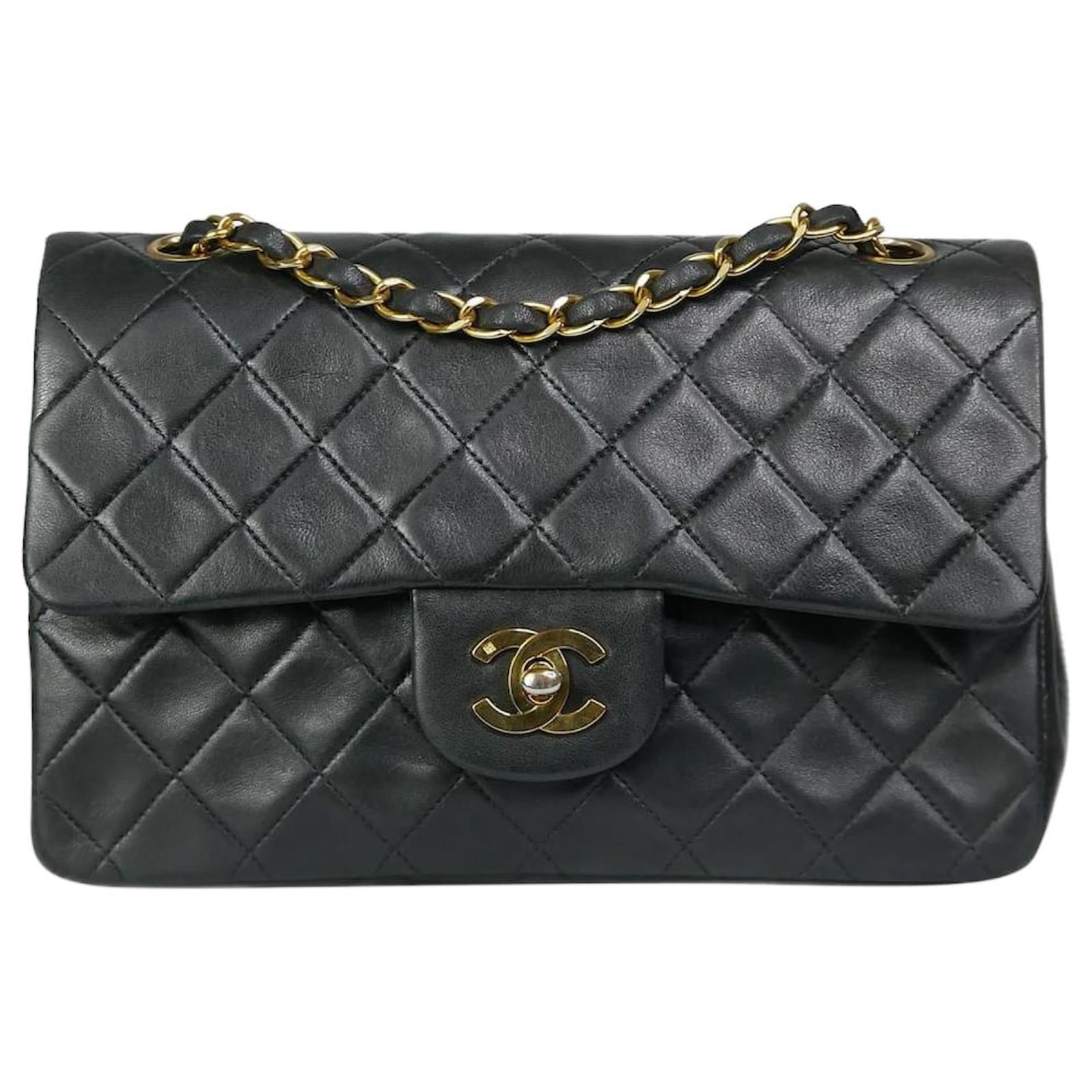 Chanel Black small lambskin Classic gold hardware double flap bag