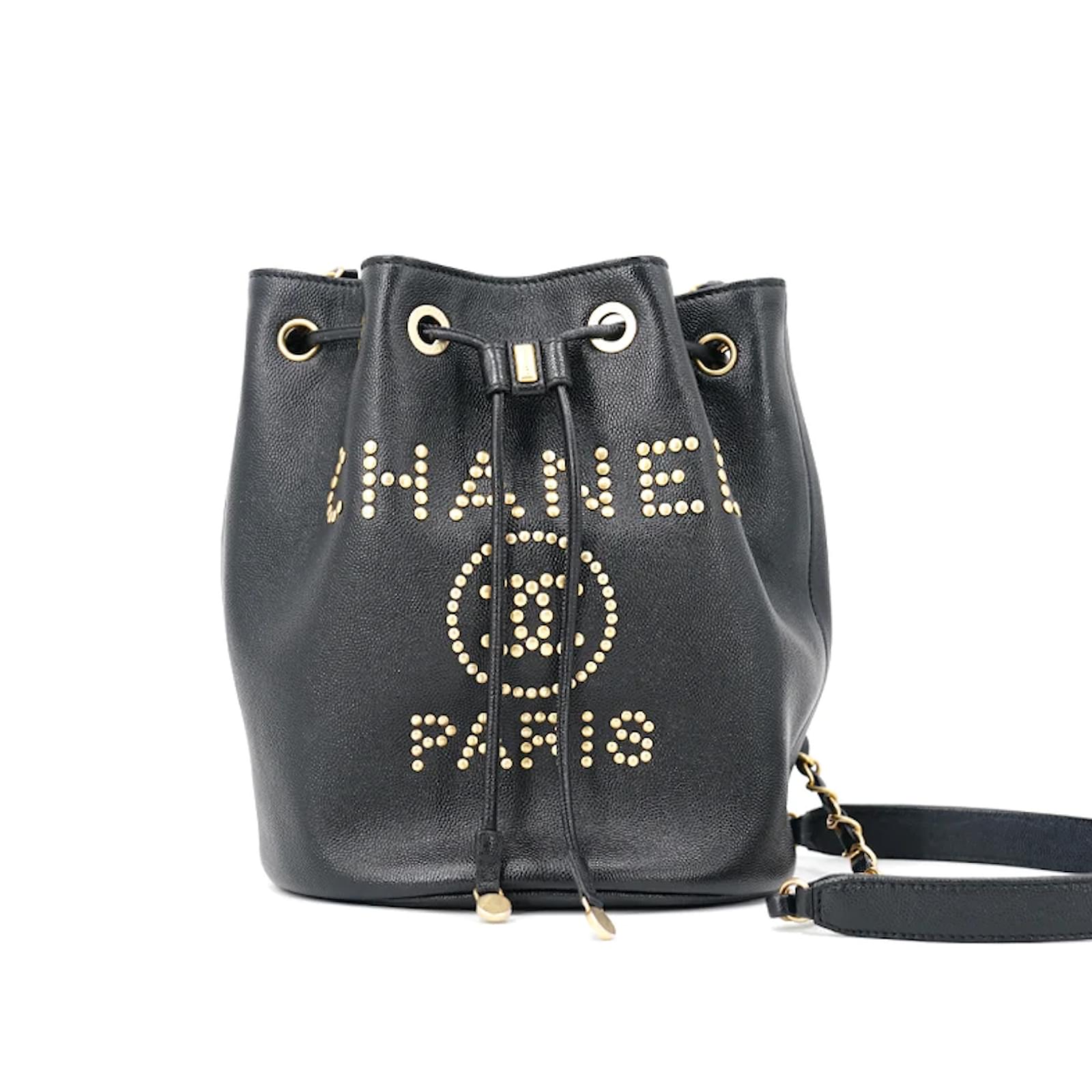 Chanel Studded Caviar Deauville Drawstring Bucket Bag Black Leather  ref.994372 - Joli Closet