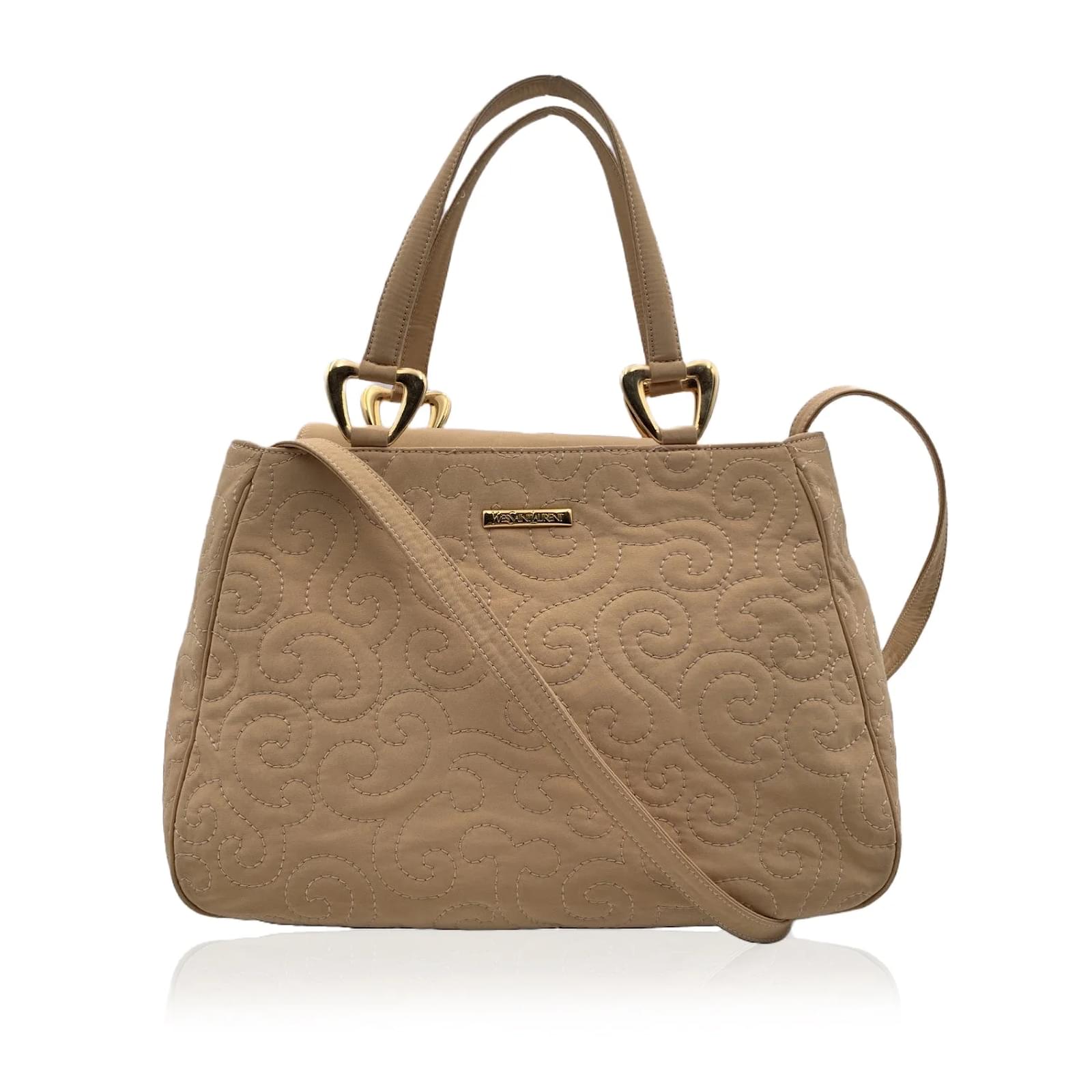 Yves Saint Laurent Mombasa handbag in beige canvas and beige