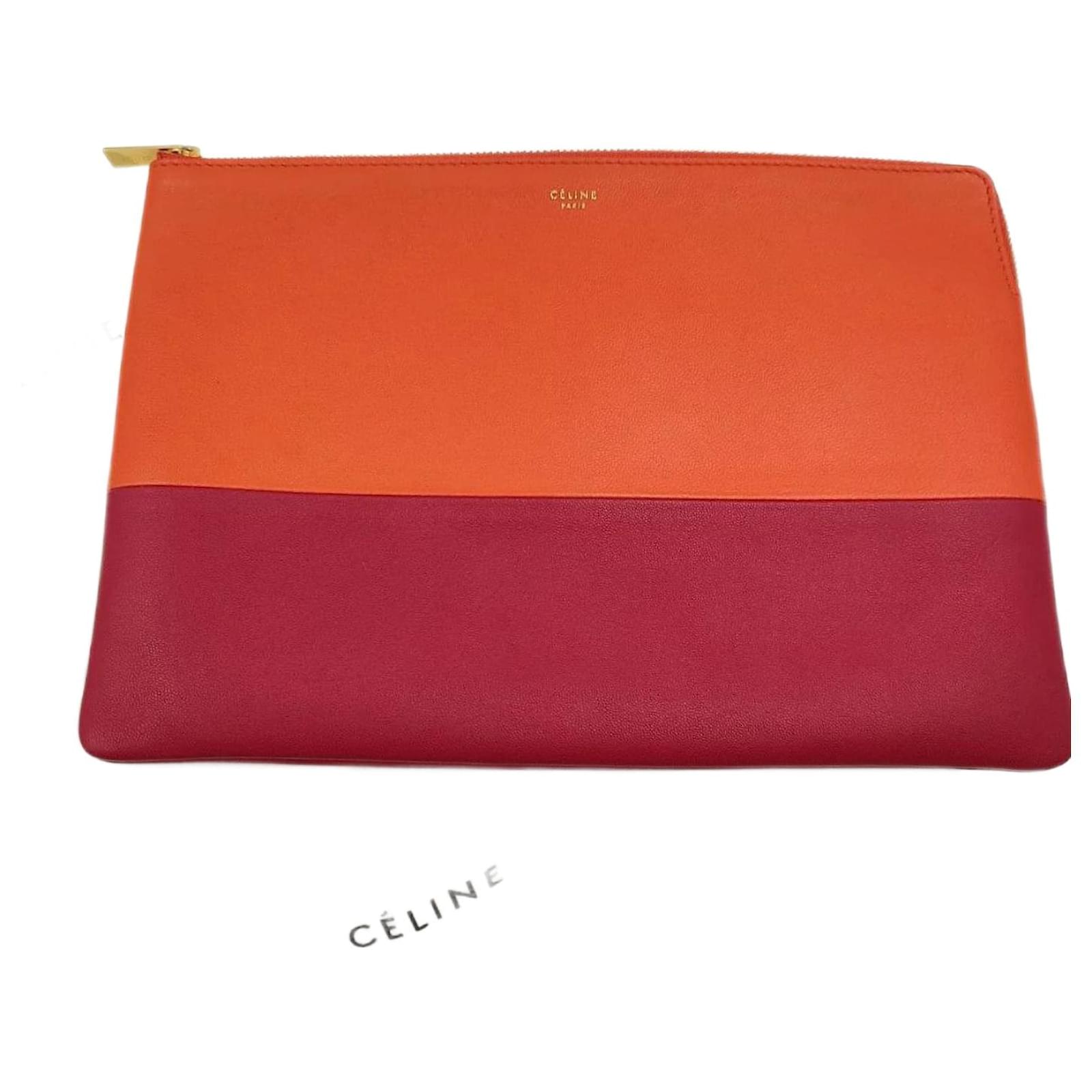 Céline Céline pochette in two-tone orange and burgundy leather