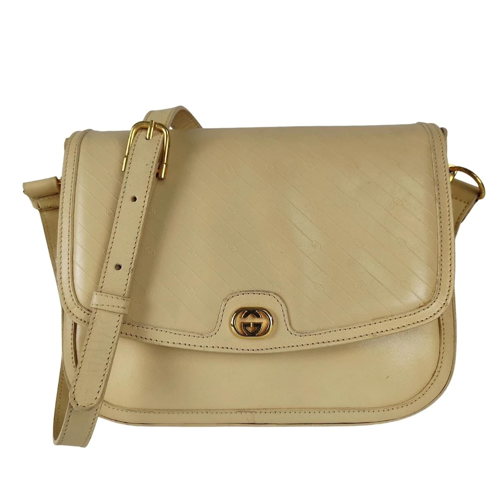 Gucci Gucci vintage 70s shoulder bag in beige leather, Camera
