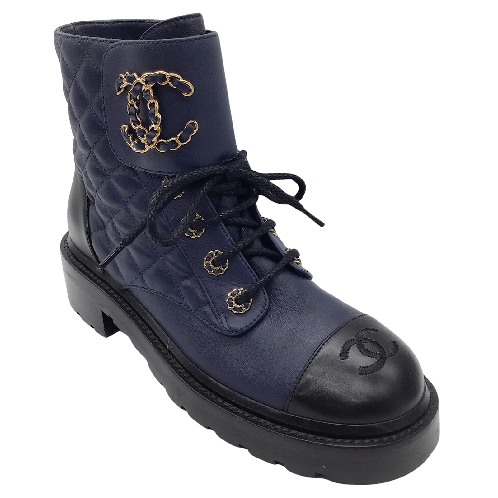 Chanel navy blue / Black CC Logo Cap Toe Quilted Lace-Up calf leather  Leather Combat Boots ref.997335 - Joli Closet