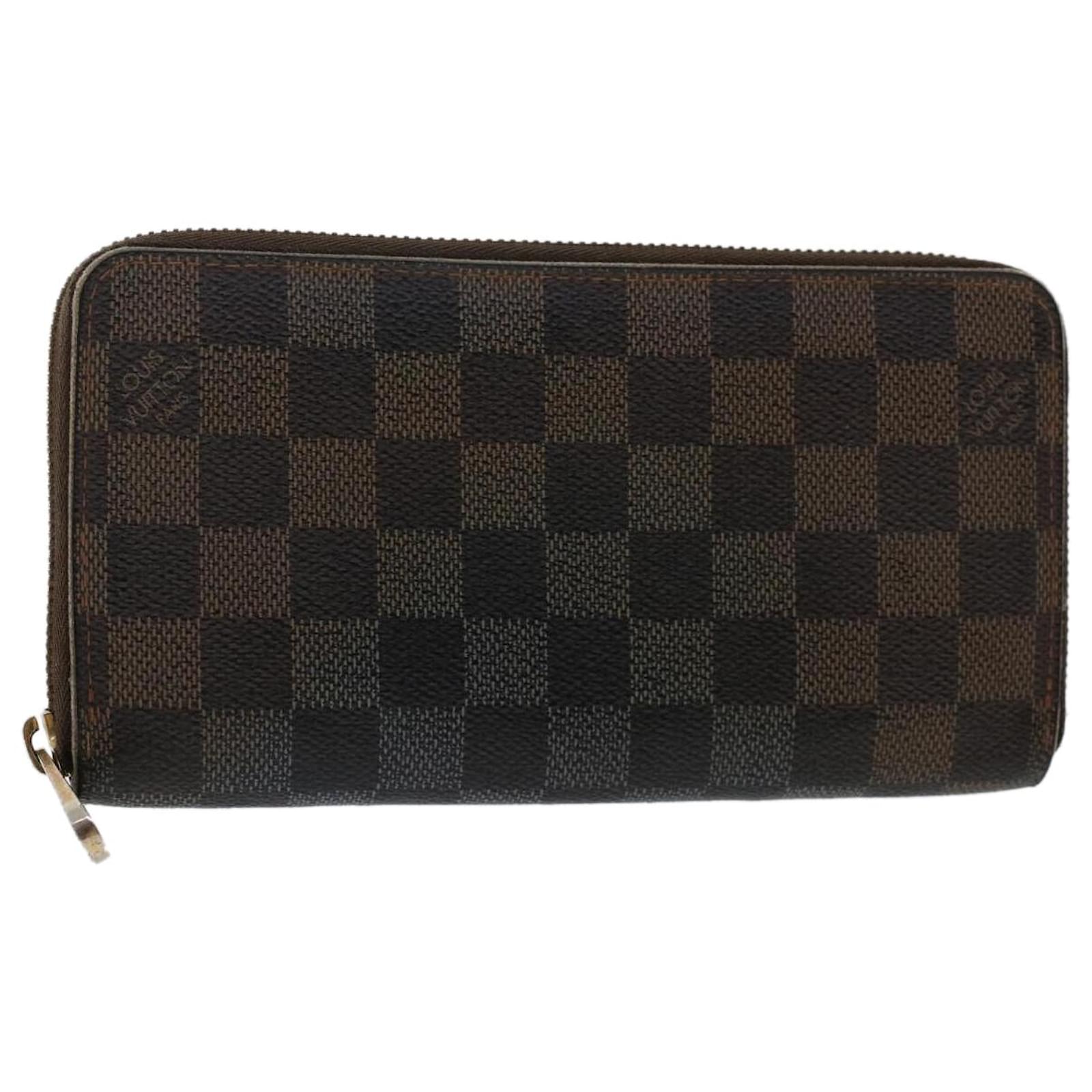 Louis Vuitton, Bags, Louis Vuitton Brown Checkered Damier Ebene Zippy  Coin Wallet