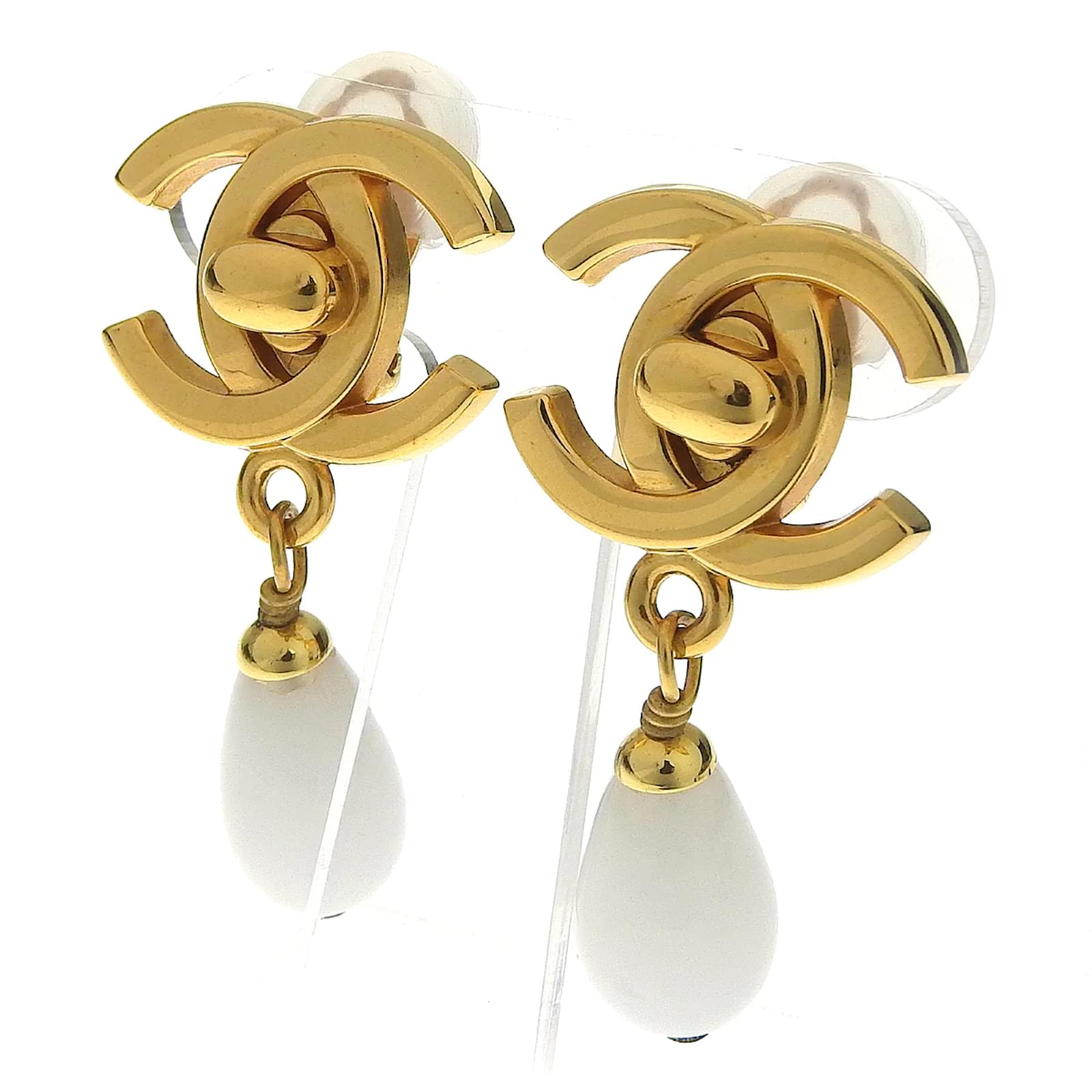 Authentic vintage Chanel earrings gold CC swing pearl drop dangle