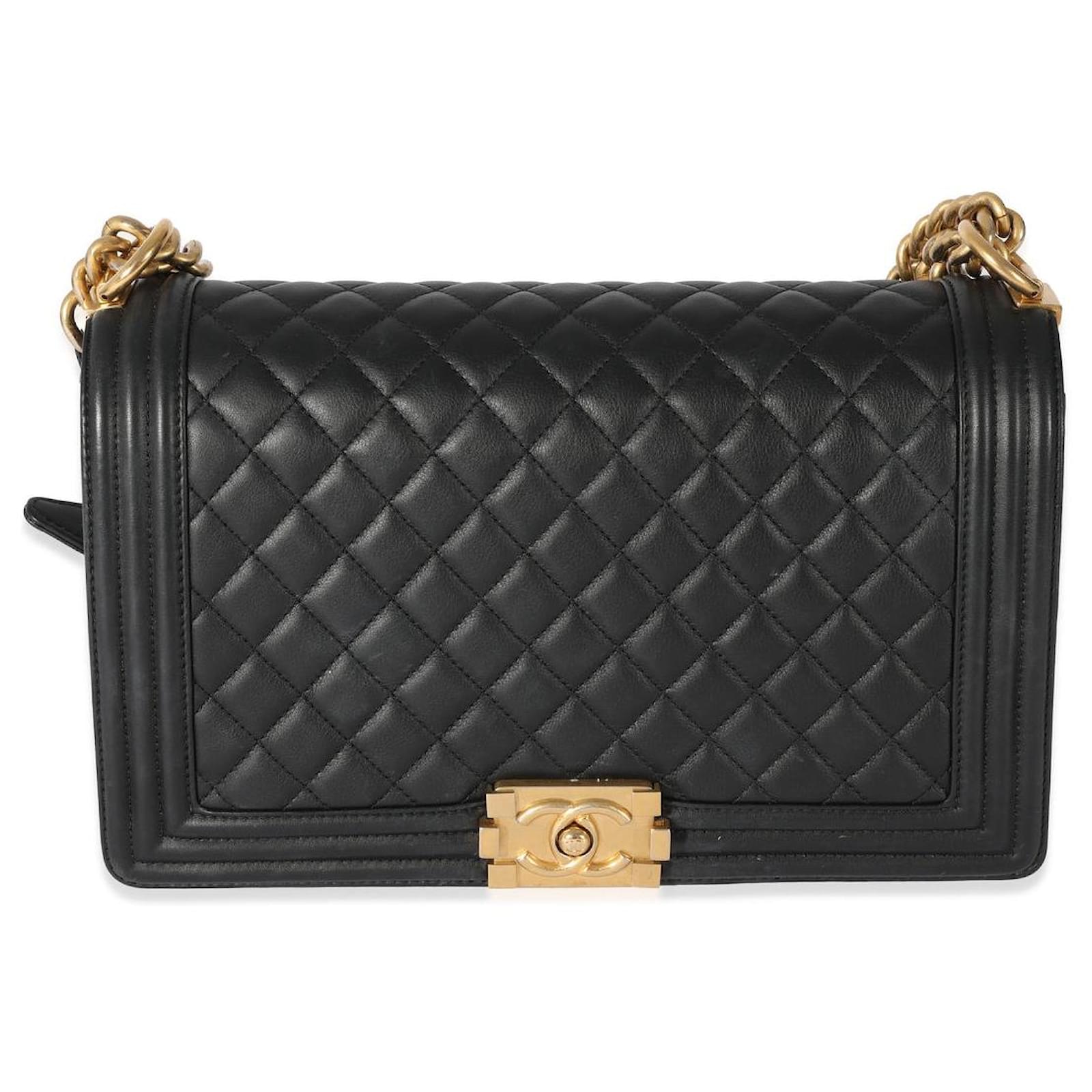 Chanel Black Quilted Lambskin Medium Boy Bag with gold hardware Leather  ref.1030584 - Joli Closet